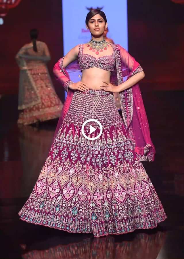 Sangria Lehenga Choli In Velvet With Colorful Resham And Sequin Flowers And Golden Cut Dana Adorned Moroccan Motifs 