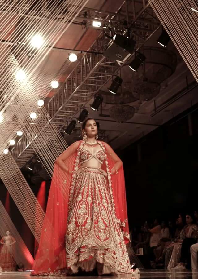 Red Lehenga And A Crop Top In Royal Heritage Embroidery, Bustier Comes In Sleeveless With Back Hooks Closure