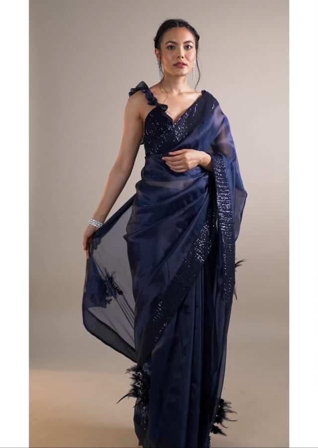 Insignia Blue Saree With A Sleeveless Ruffled Crop Top In Sequins Embroidery