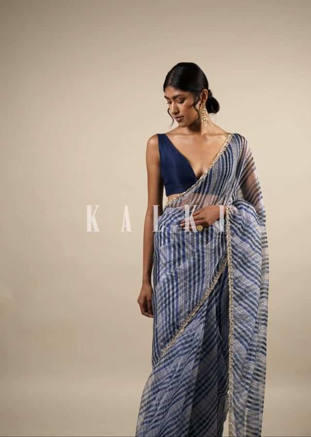 Deep Marine Blue And Black Leheria Print Saree In Moti Embroidery, Crafted In Organza With Moti Embroidery Floral Buttis 