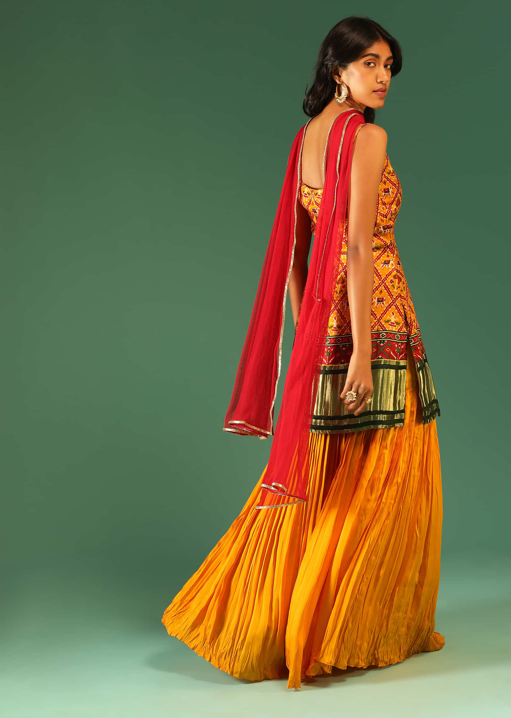 Amber Yellow Sharara Suit In Satin With Patola Print And Brocade Border  