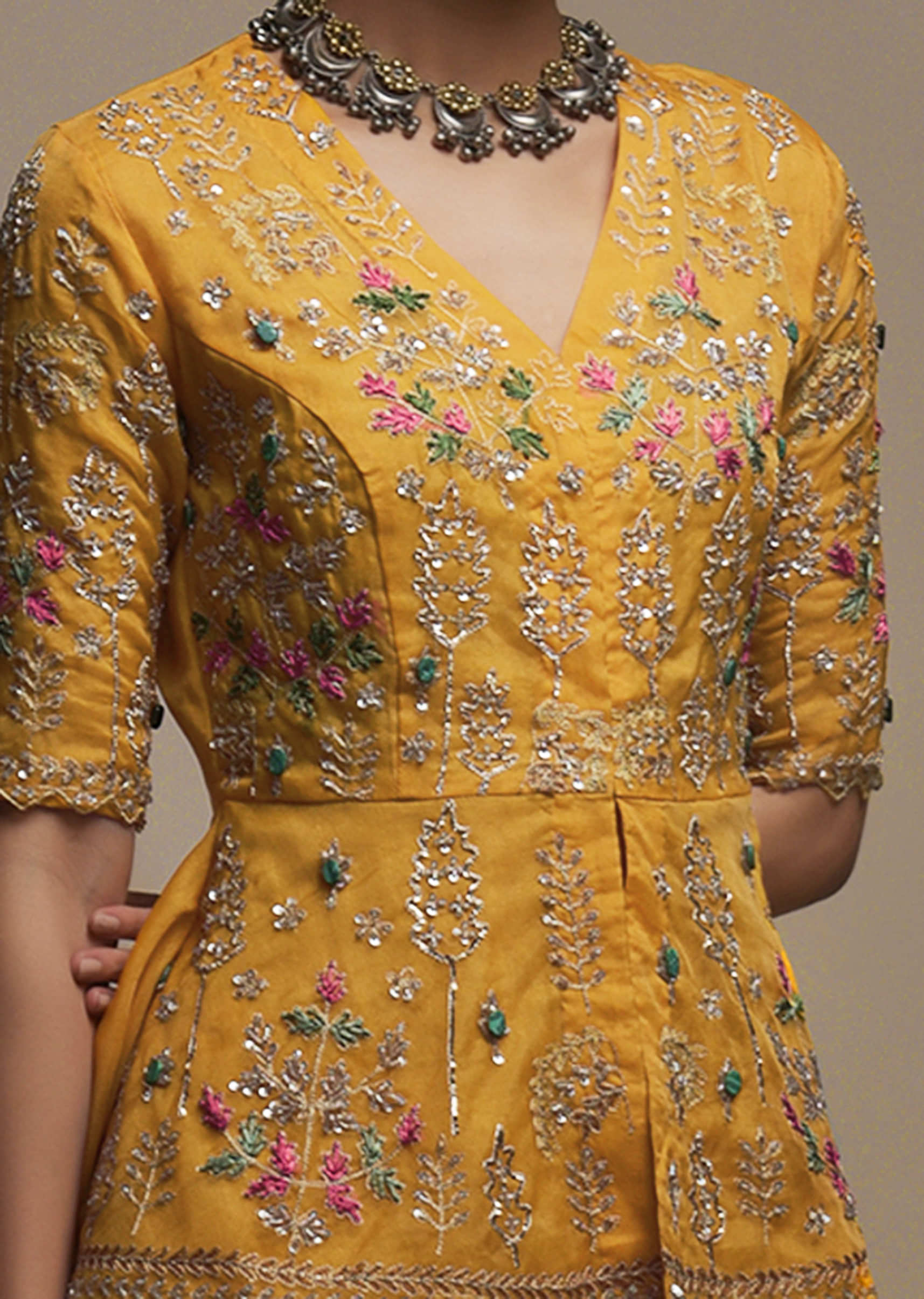 Dark Amber Yellow Palazzo Suit In Organza With Matching Peplum Top Adorned In Zari And Thread Work