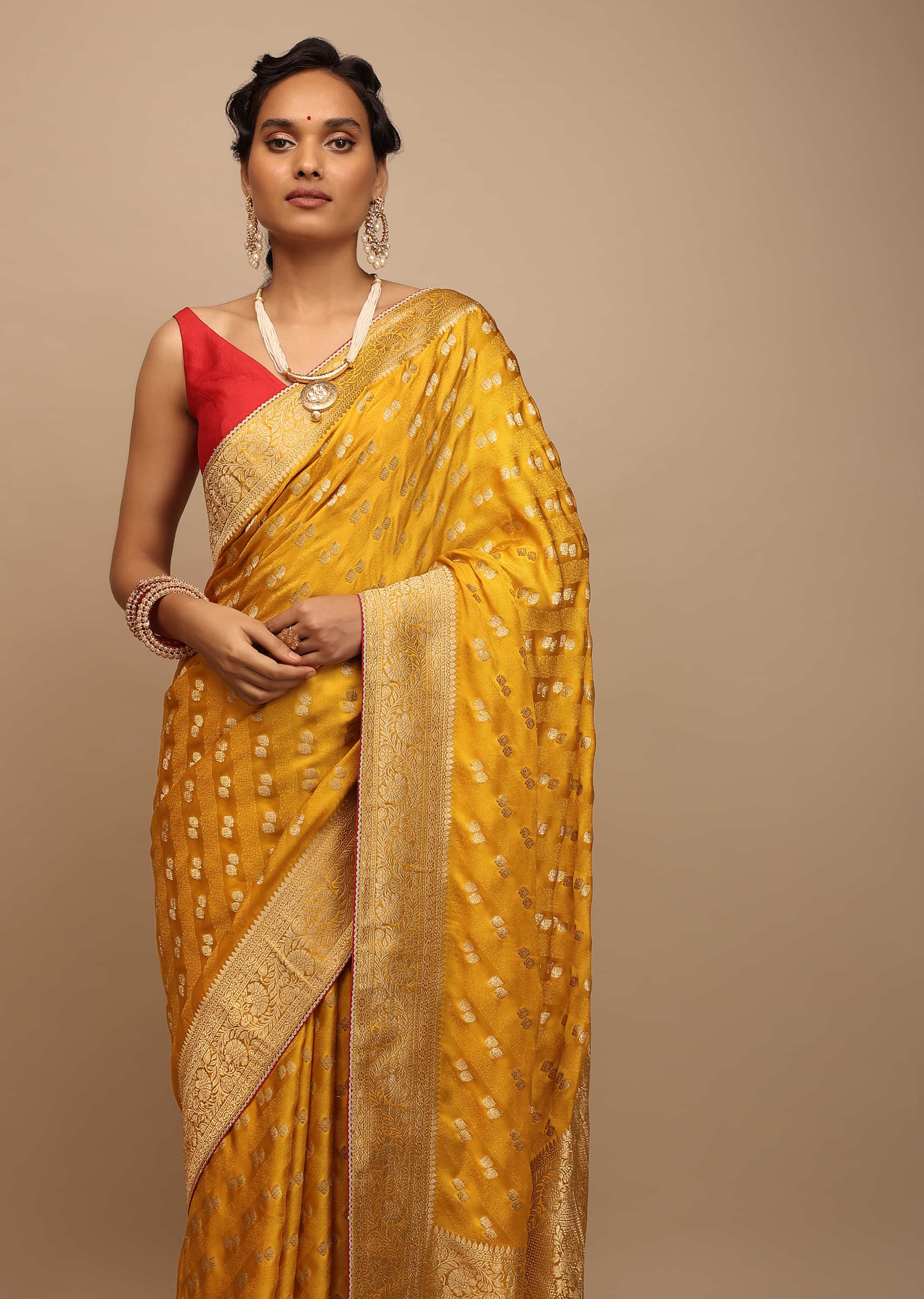 Amber Yellow Saree In Satin With Woven Golden Buttis And Floral Pallu Design