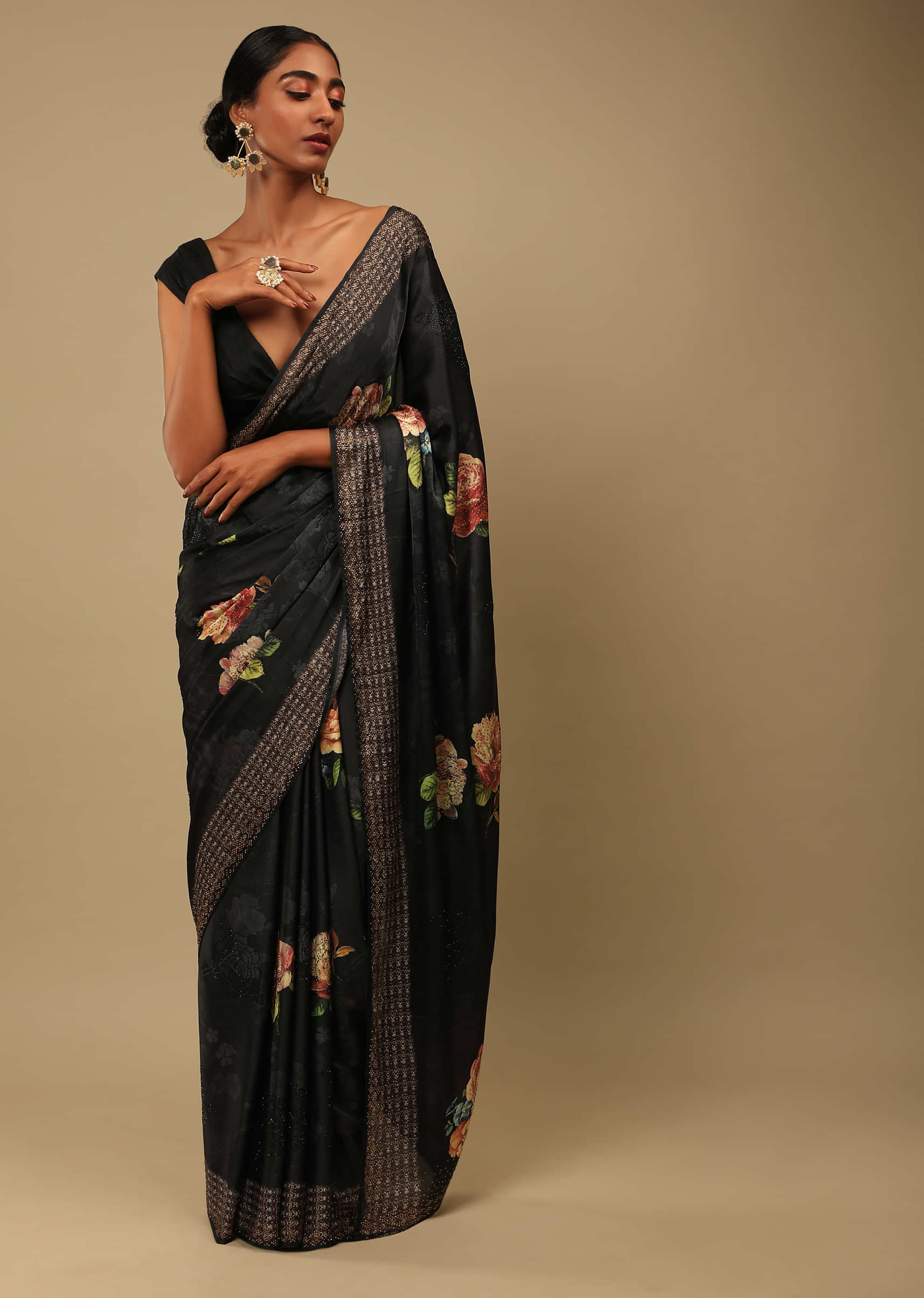Ash Black Saree In Satin Crepe With Rose Print And Kundan Detailed Border Along With Unstitched Blouse  