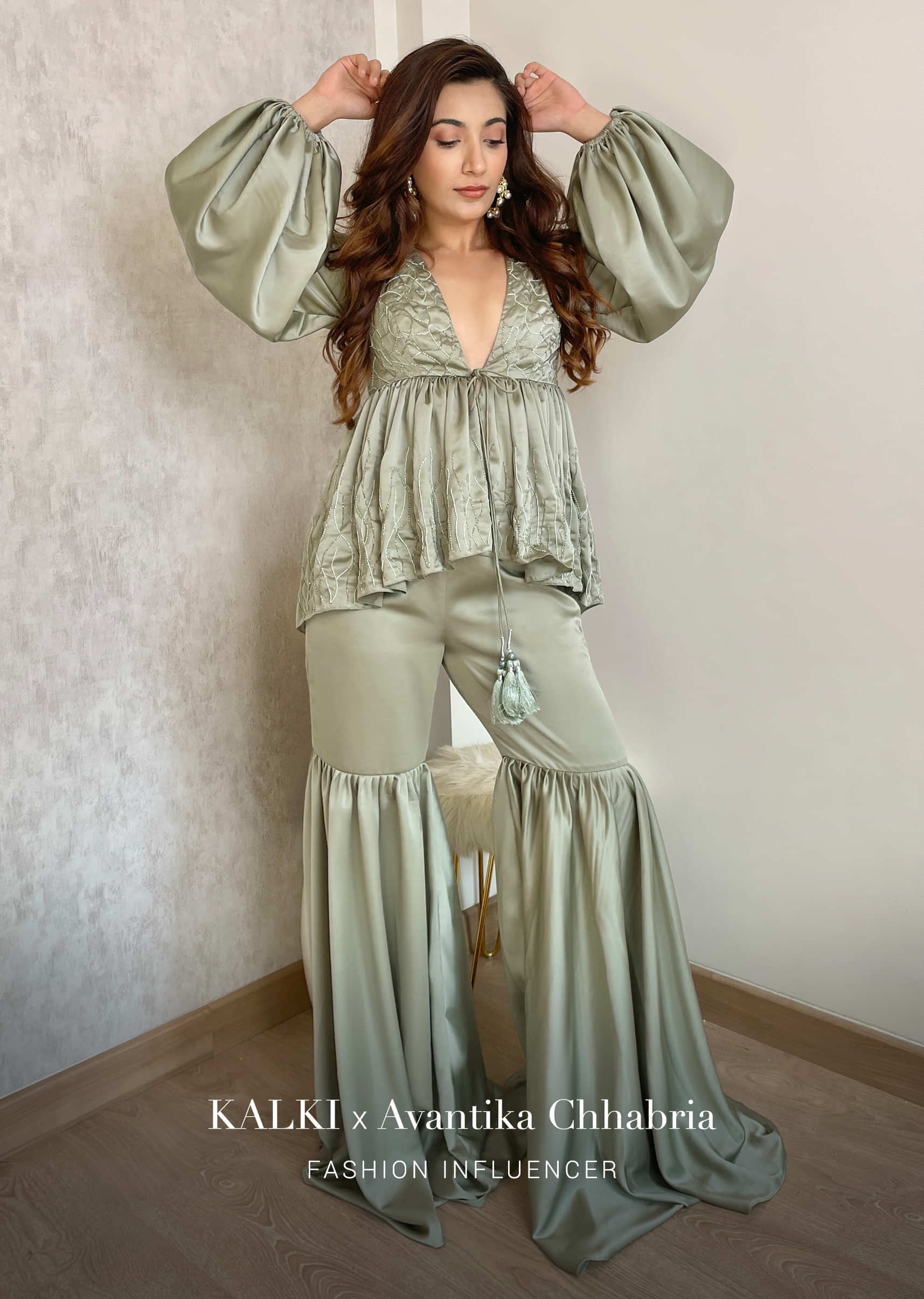 Sage Green Sharara Suit In Satin With A Peplum Top Featuring Plunging Neckline And Balloon Sleeves