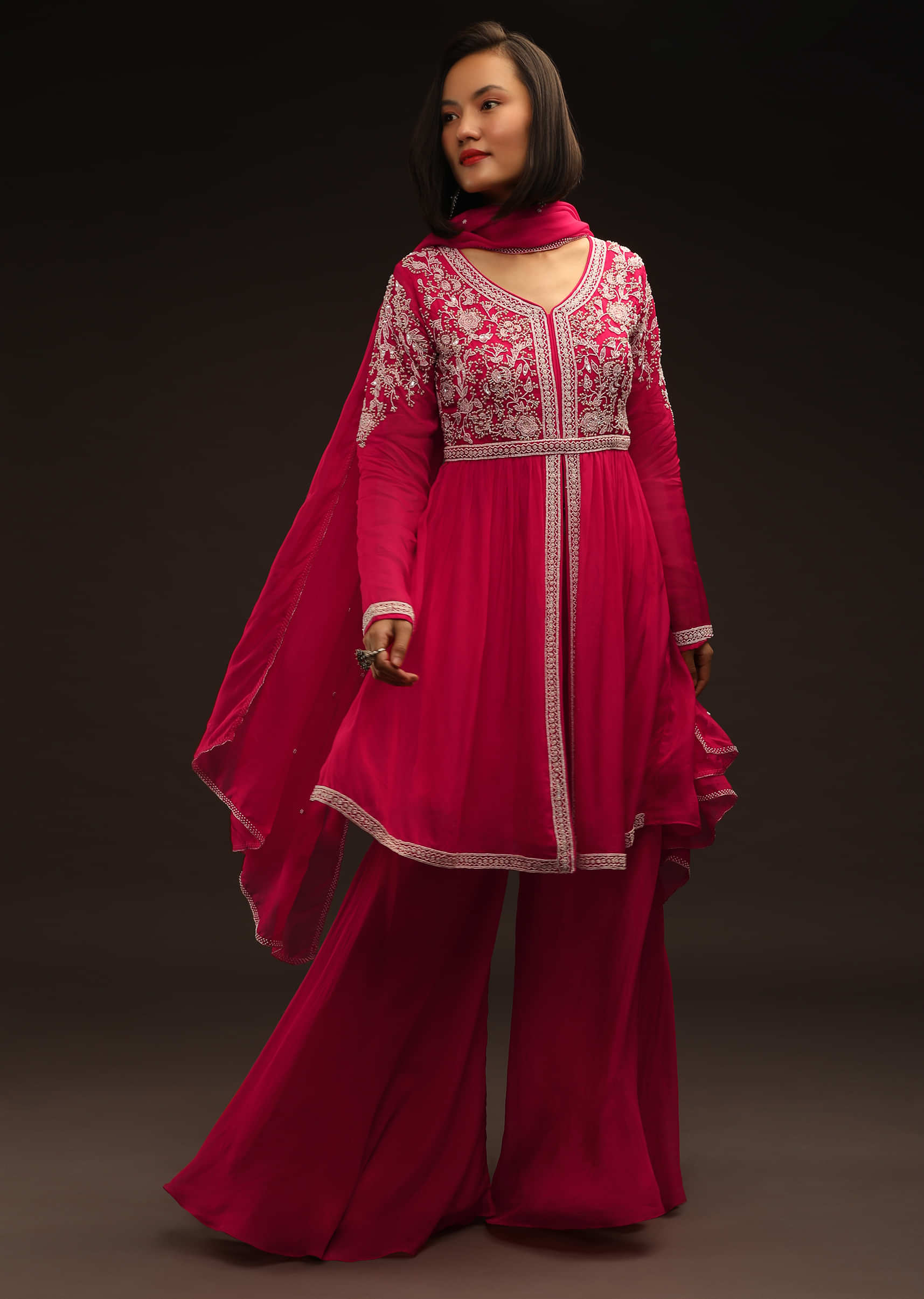 Azalea Pink Sharara And Peplum Suit With Moti And Sequins Embroidered Floral Design And Bell Sleeves