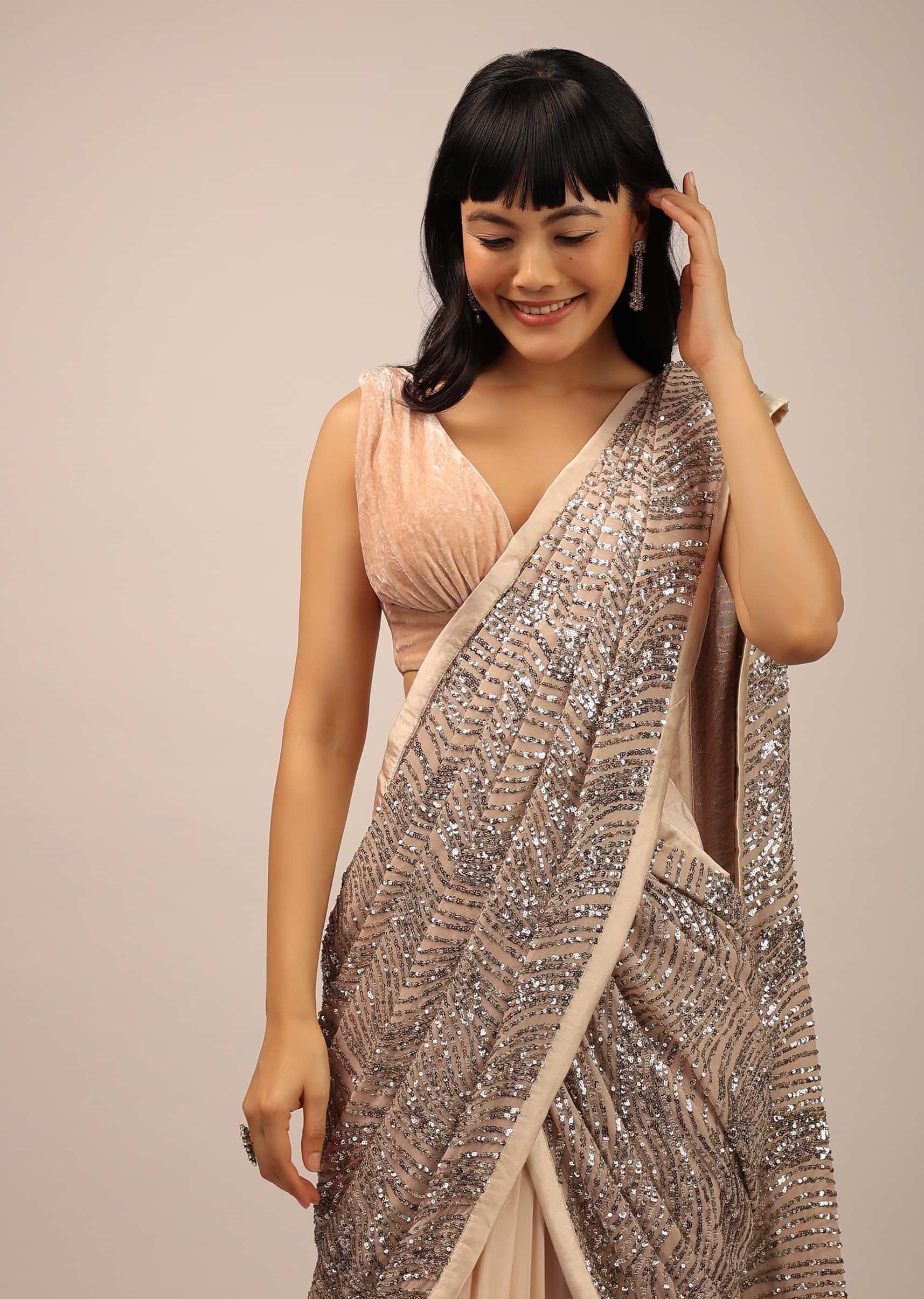 Beige Ready Pleated Saree With Sequins Work In A Floral Pattern And Velvet Blouse