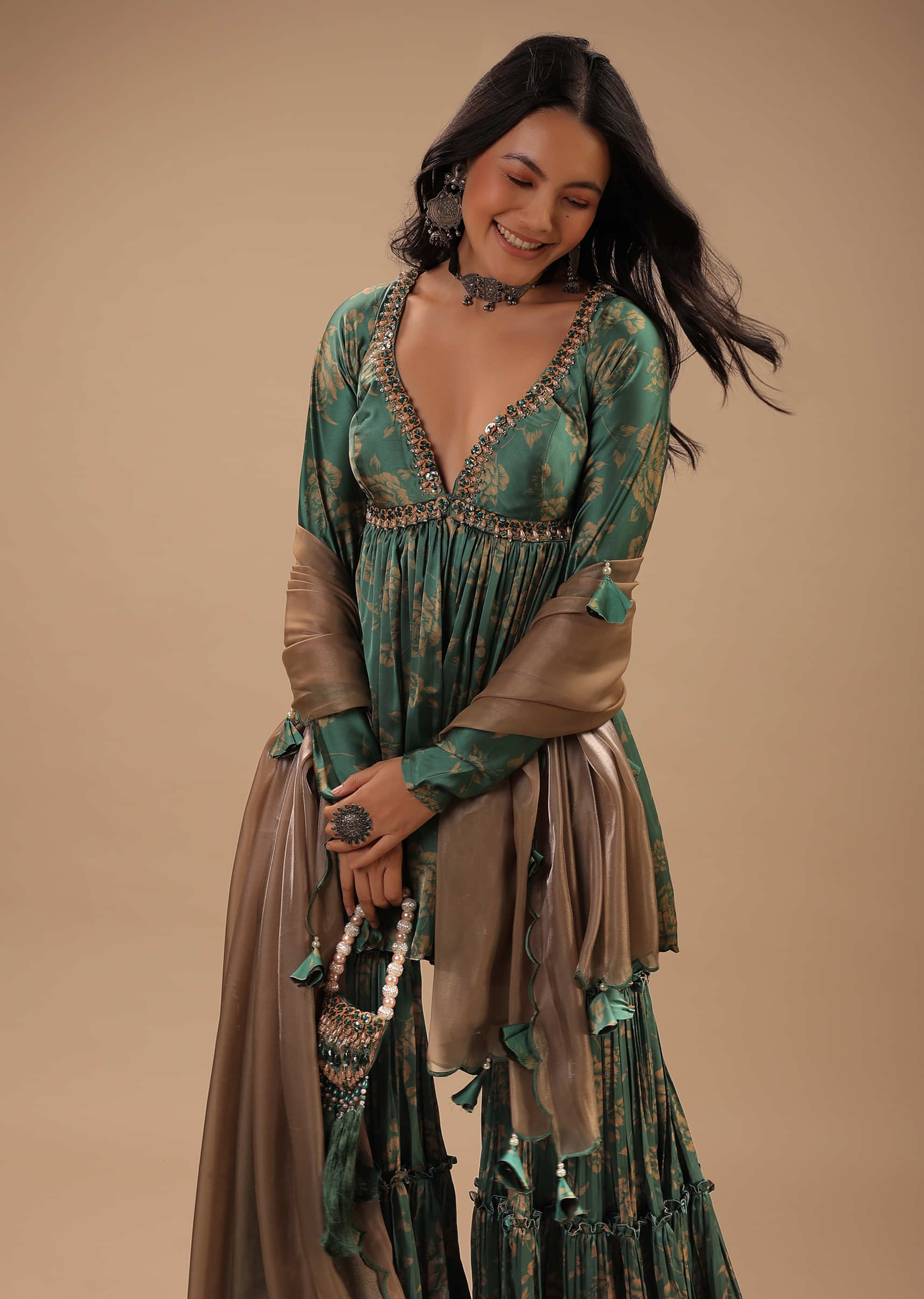 Beryl Green Peplum Sharara Suit With Front Slit And Plunging Neckline