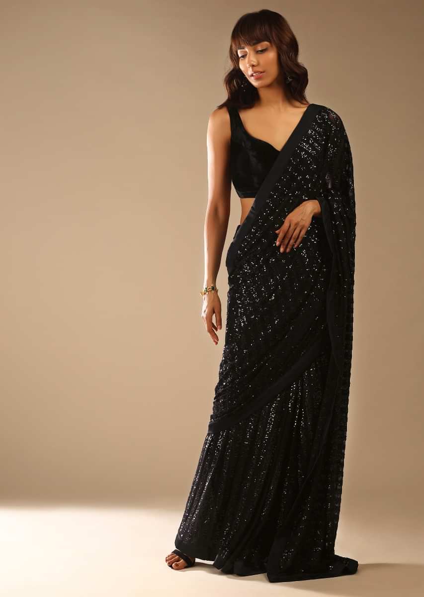 Black Ready Pleated Saree Embellished In Sequins And A Sleeveless Velvet Blouse With A Front Cut Out  