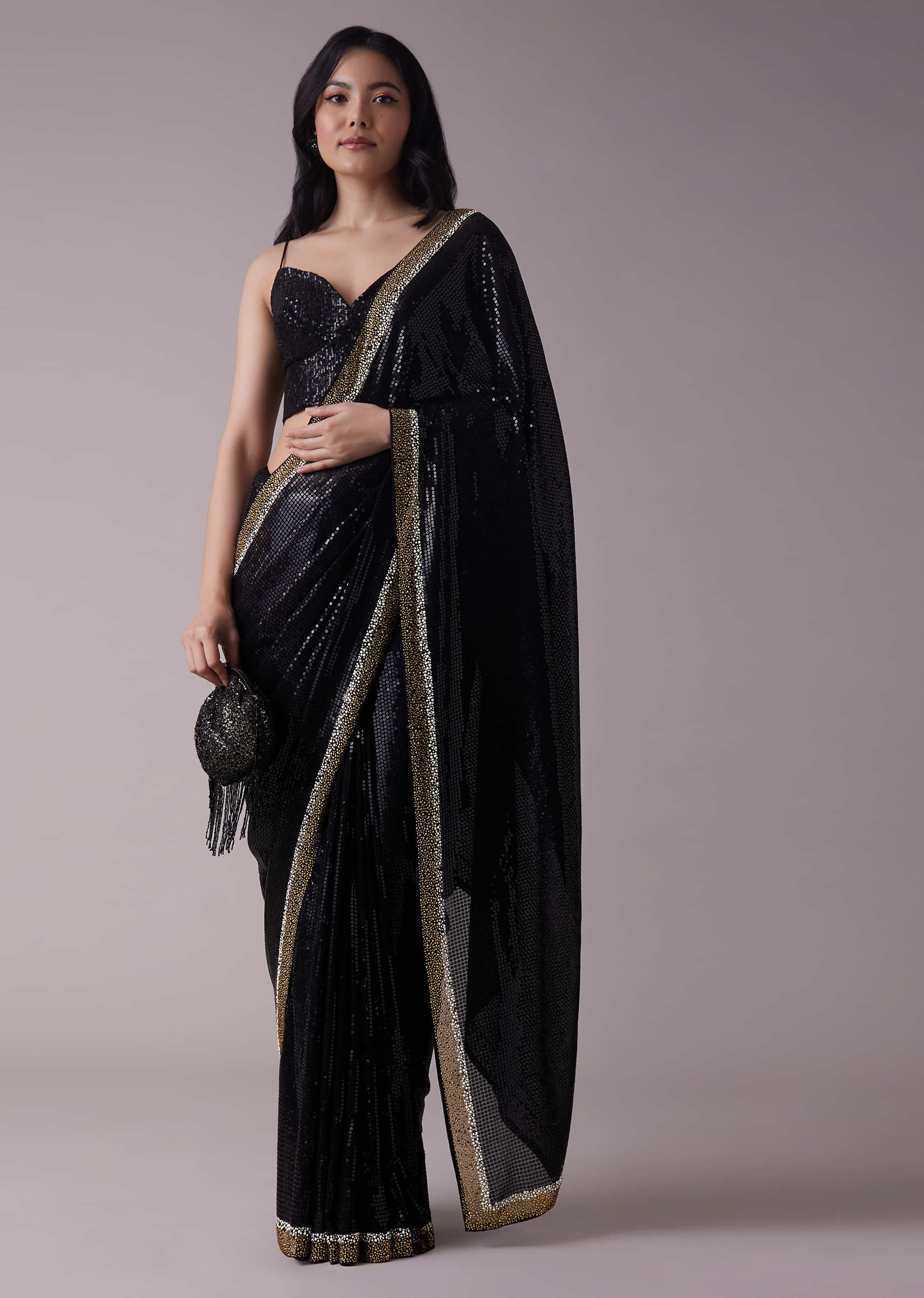 Black Sequins Saree With An Embellished Border