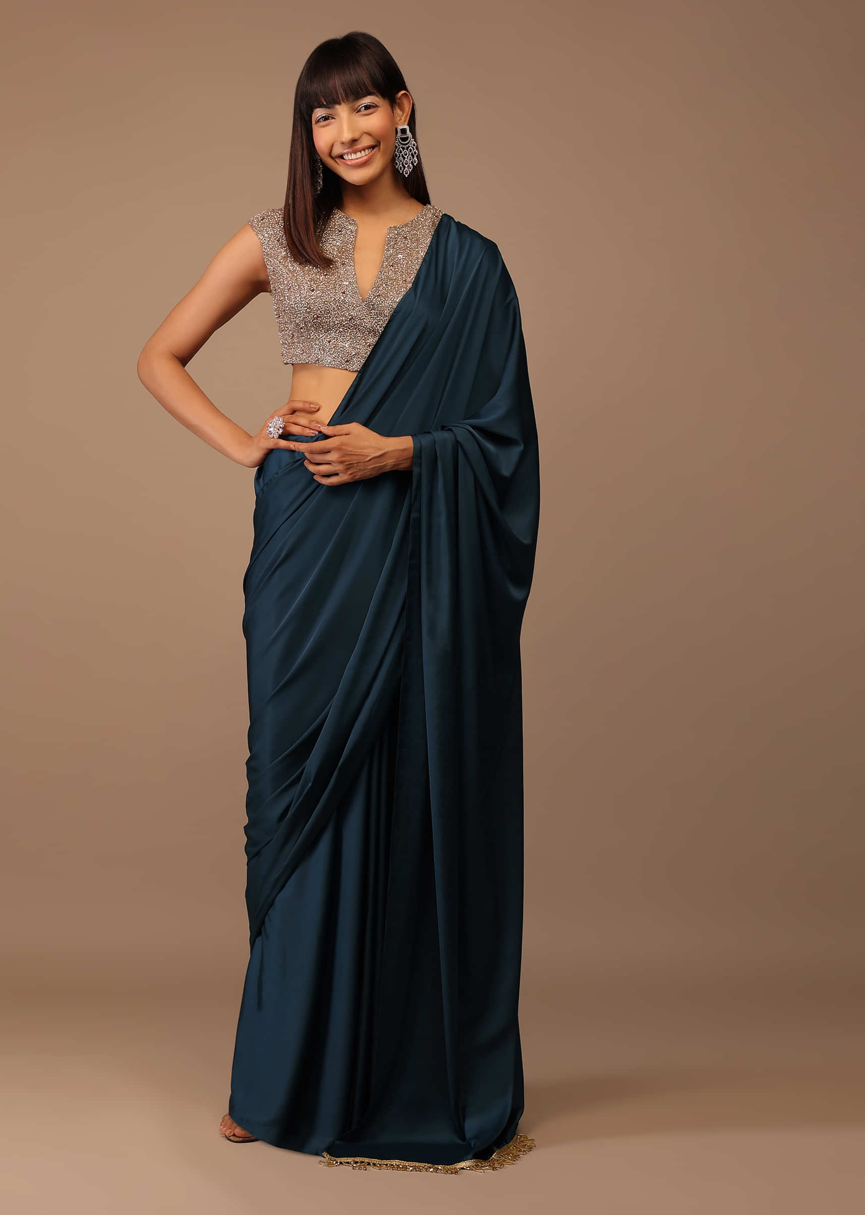 Blue Satin Saree With Fringes On Pallu Matched With V Deep Neck Hand Embroidered Crop Top