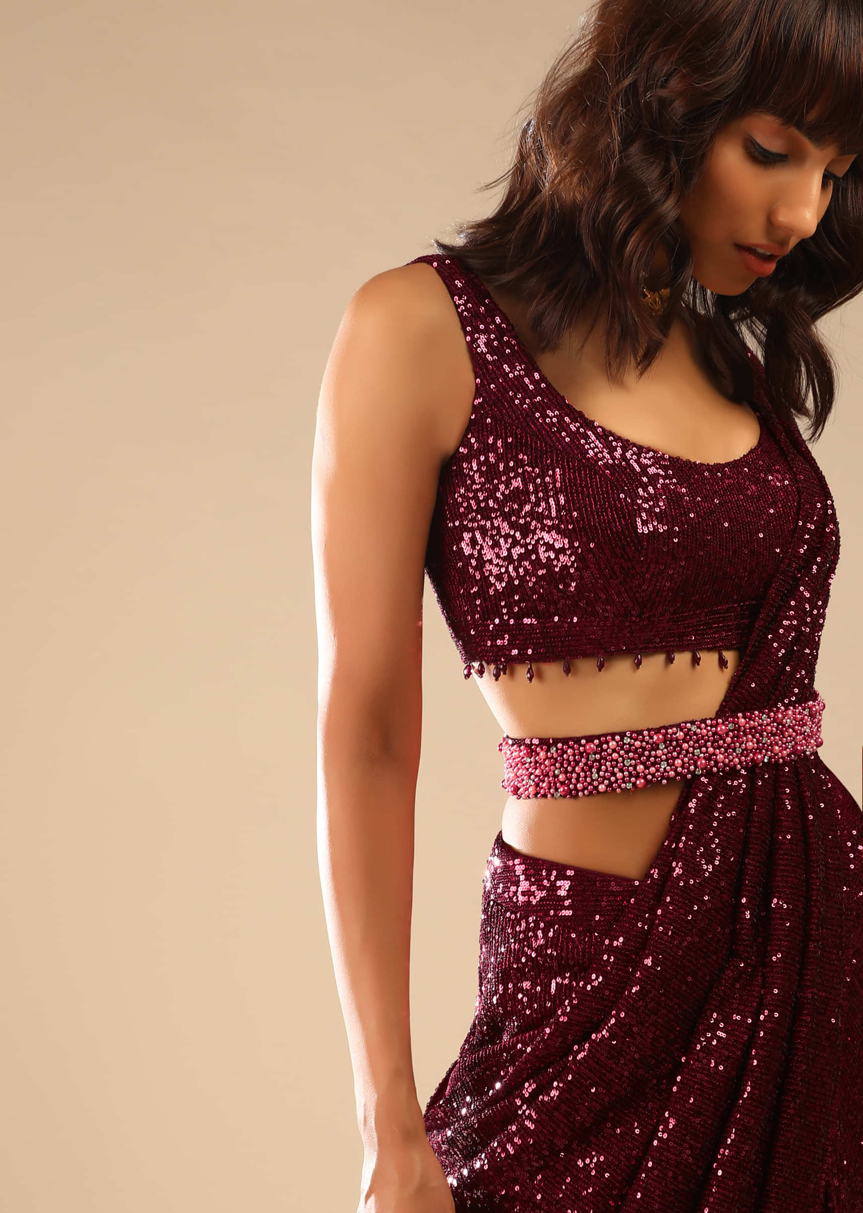 Burgundy Ready Pleated Saree Embellished In Sequins With Bead Fringes, Moti Embellished Belt And Matching Sequins Blouse