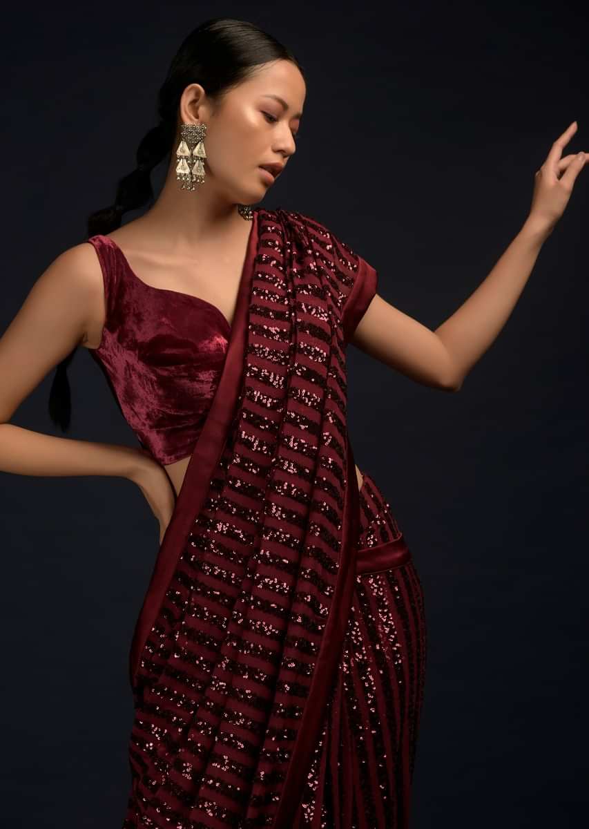 Burgundy Red Ready Pleated Saree In Net With Sequin Embellished Stripes And Matching Velvet Crop Top