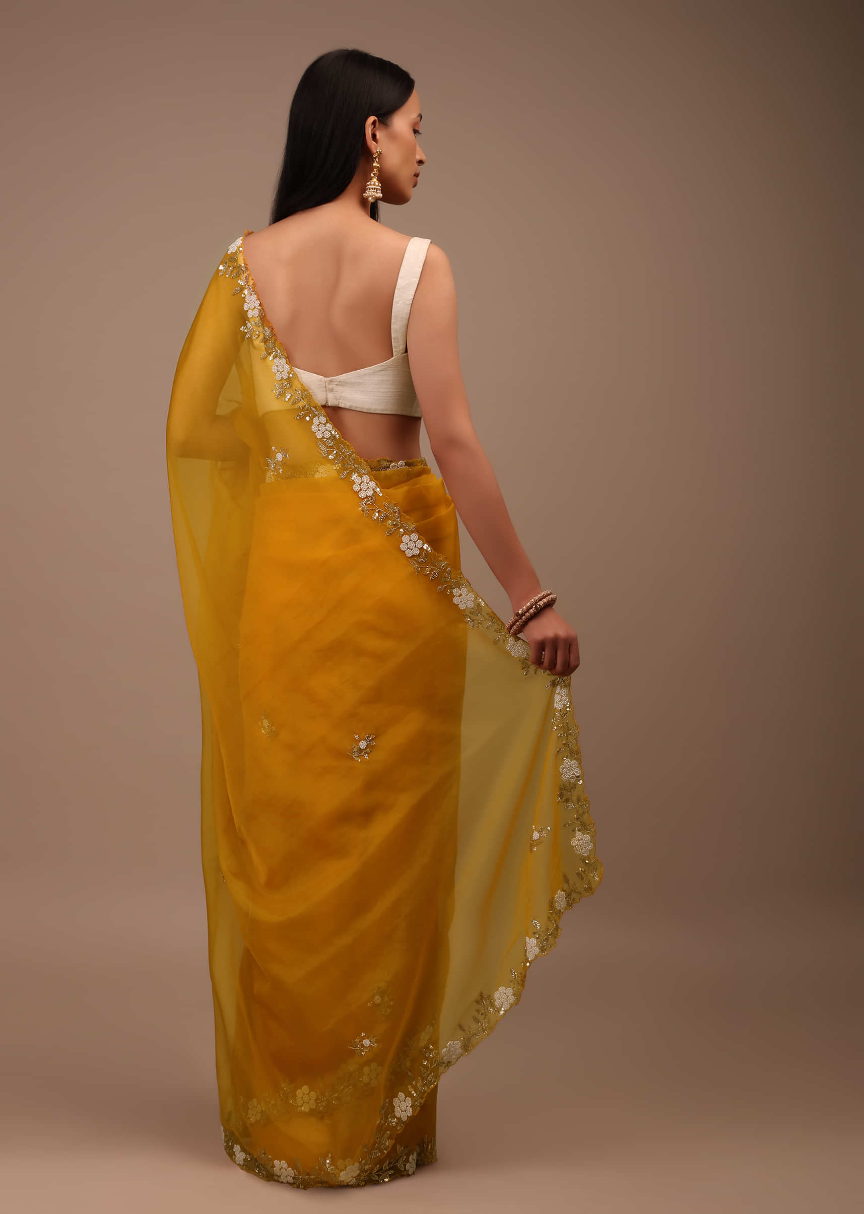 Butterscotch Yellow Saree In Organza With Hand Embroidered Moti And Cut Dana Work On The Border And Butti Design