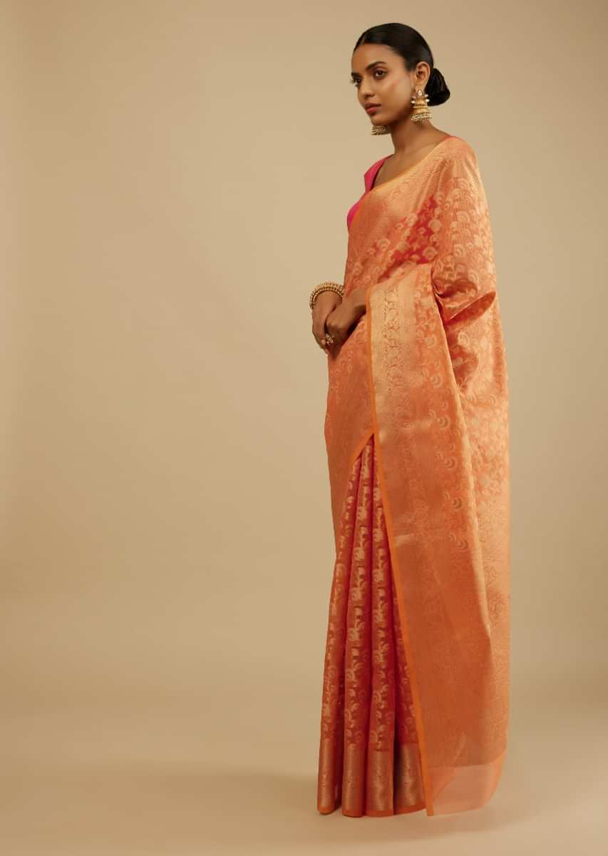 Camelia Orange Saree In Organza Silk With Woven Floral Jaal In Shades Of White And Gold Along With Unstitched Blouse Online - Kalki Fashion