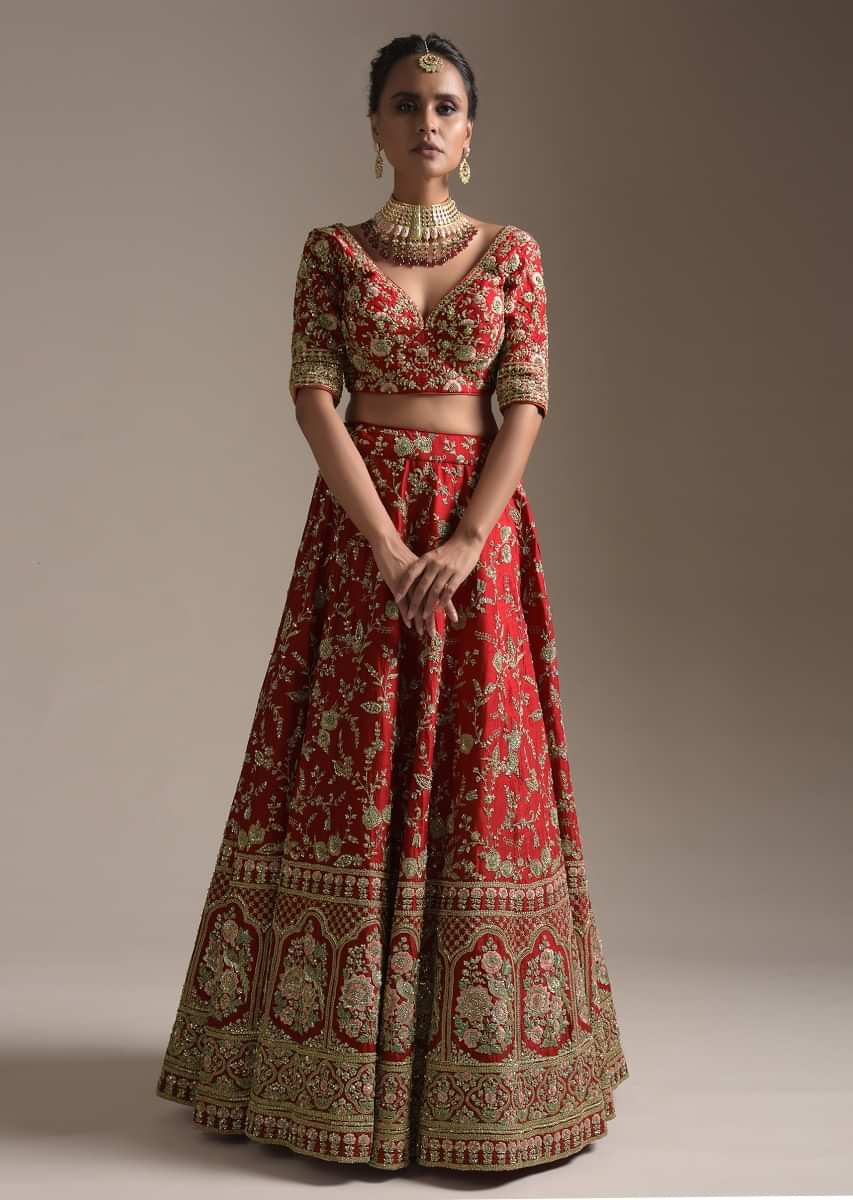 Carmine Red Lehenga Choli In Raw Silk With Zari Embroidered Floral Jaan And Resham Mughal Motifs 