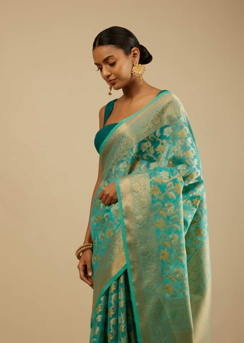 Ceramic Blue Saree In Organza Silk With Woven Floral Jaal In Shades Of Yellow And Gold Along With Unstitched Blouse  