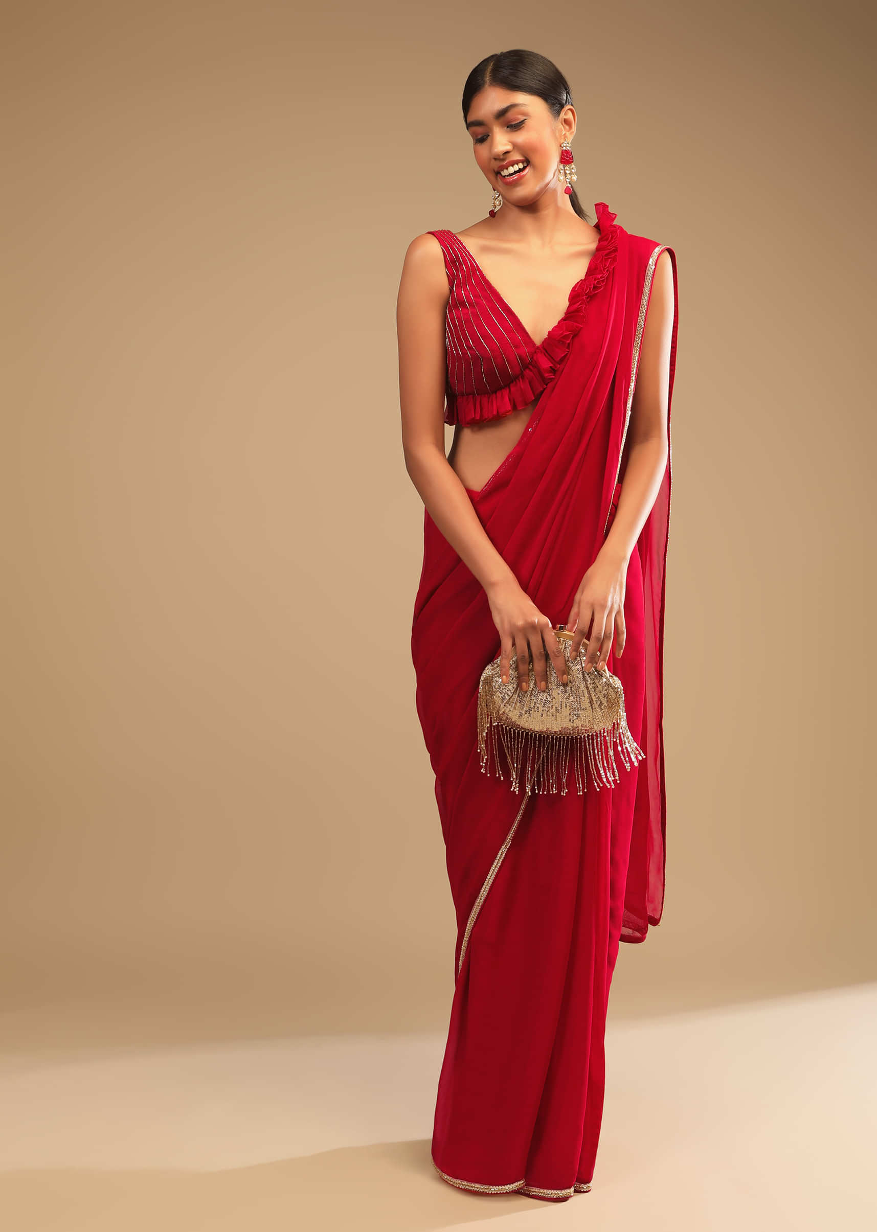 Cherry Red Saree In Georgette With Sequins And Cut Dana Embellished Border And A Ruffle Frill Adorned Crop Top  