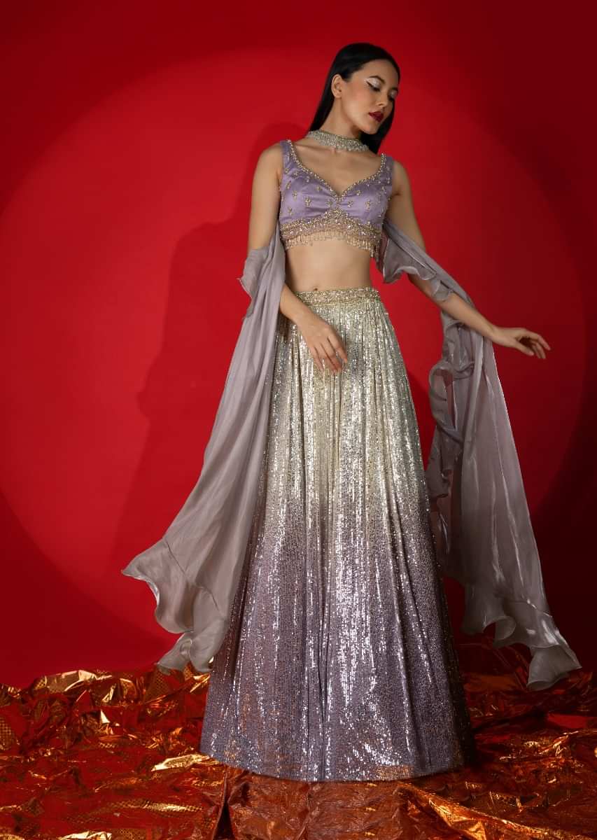 Cream And Lavender Shaded Sequins Lehenga With Hand Embroidered Lavender Choli And Ruffle Dupatta