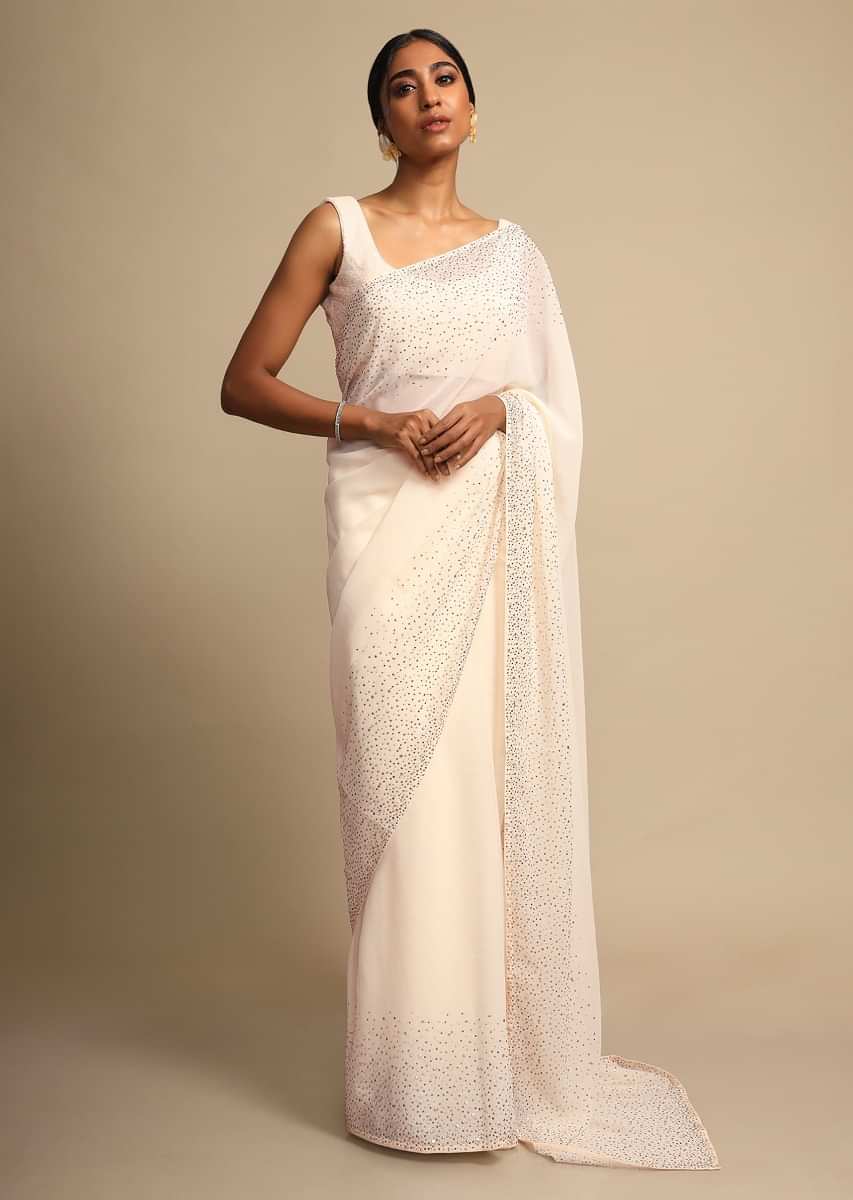 Daisy White Saree In Georgette With Kundan Embellished Border Online - Kalki Fashion