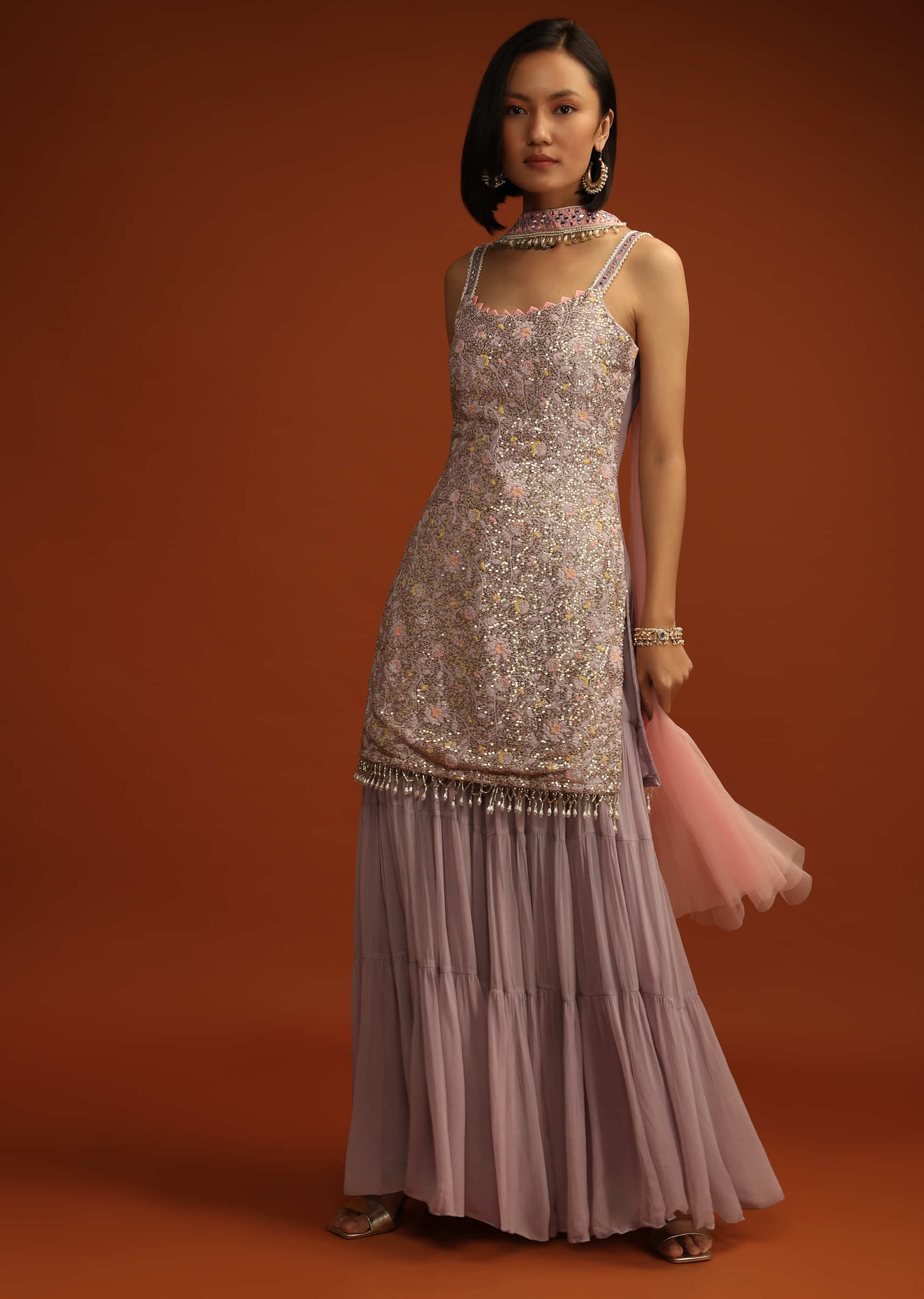 Dusty Lavender Sharara Suit In Georgette With Pastel Colored Resham And Sequins Embroidered Jaal And Cut Dana Fringes