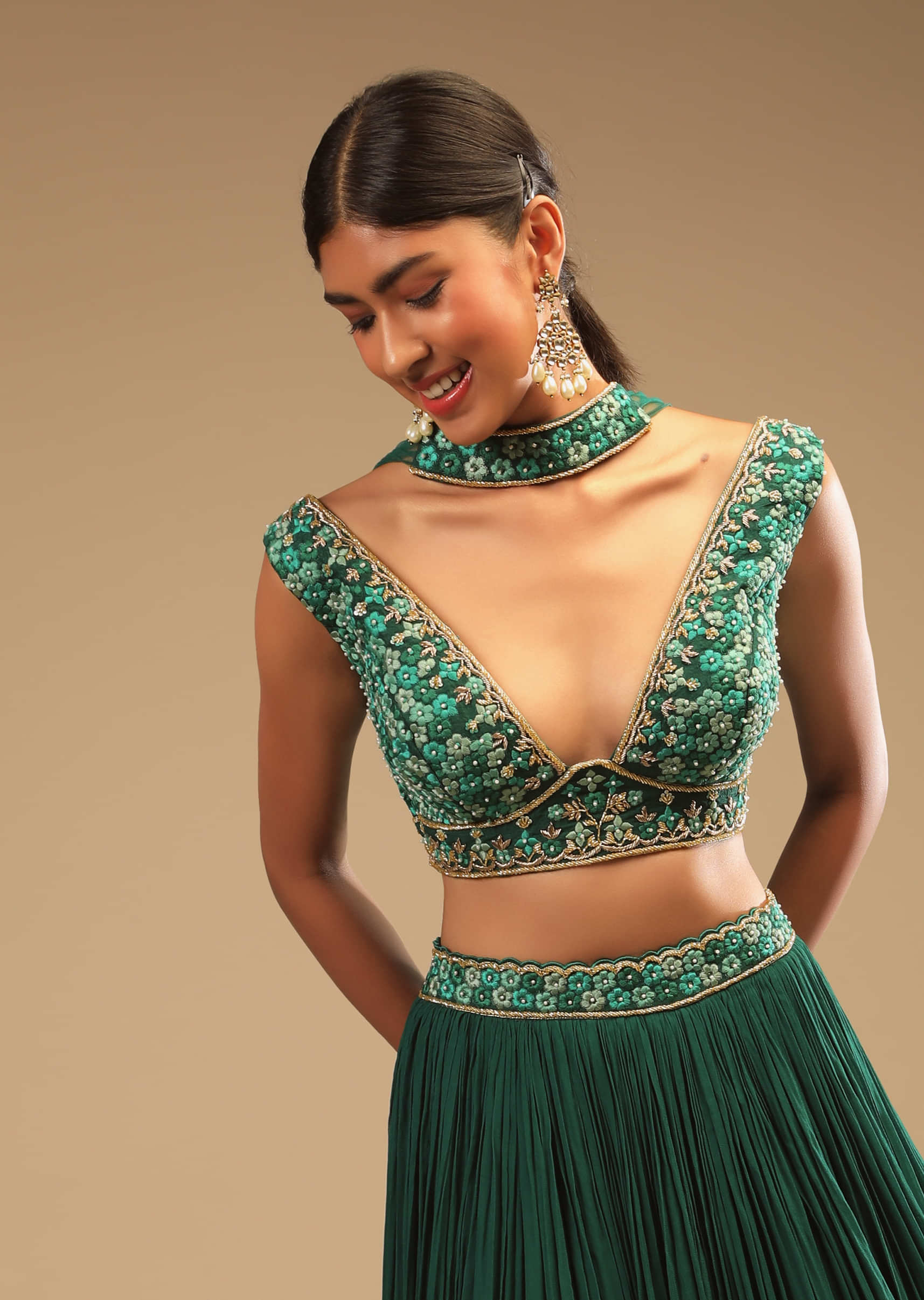 Emerald Green Lehenga In Georgette With A Plunging Neck Crop Top Featuring Floral Hand Work And Choker Dupatta 