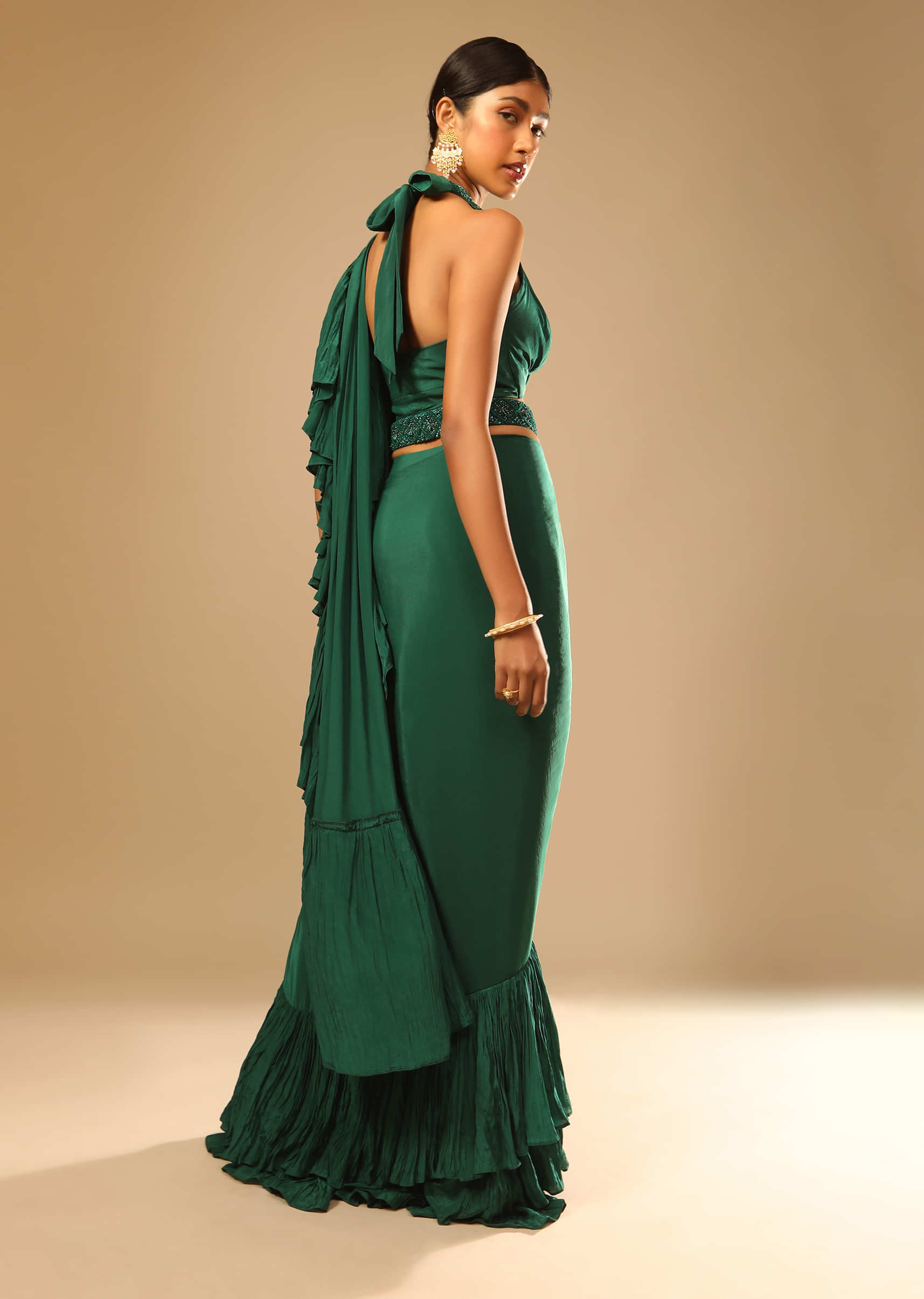 Emerald Green Ready Pleated Ruffle Saree With A Halter Neck Blouse And 3D Embroidered Belt  