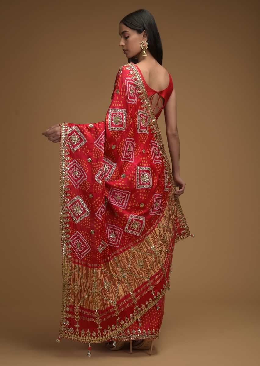 Fiery Red Saree With Bandhani Print And Gotta Work Along With Unstitched Blouse