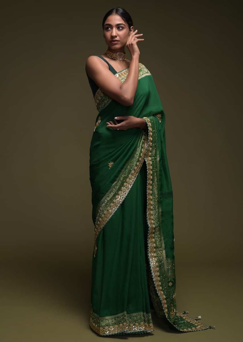 Forest Green Saree In Crepe Silk Blend With Gotta Patti Embroidered Buttis And Woven Border  