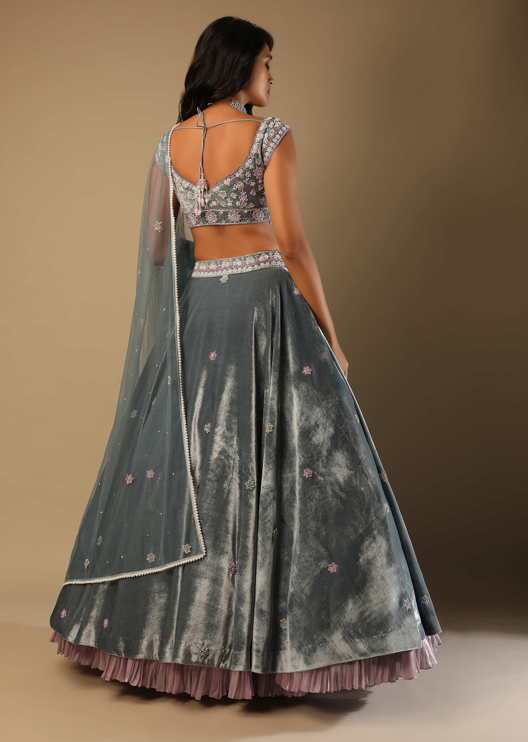 Frozen Blue Lehenga With Multi Colored Hand Embroidered Floral Buttis And Heavy Embroidered Choli 
