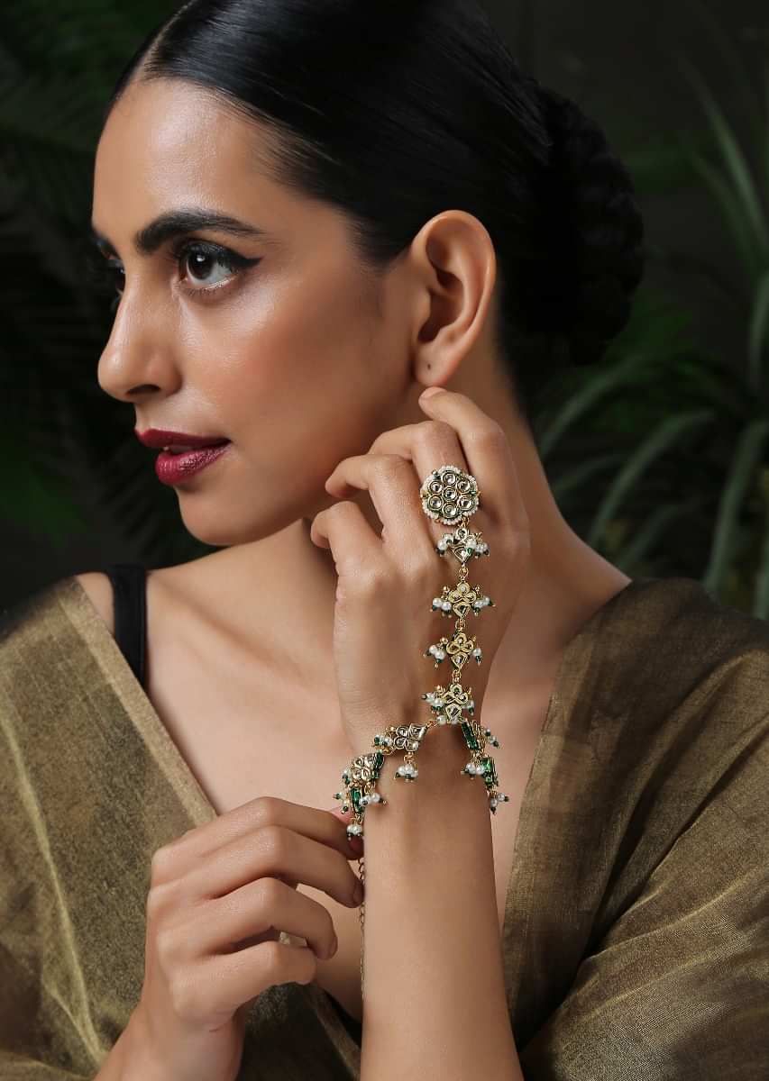 Gold And Green Hathphool Features Kundan In An Exquisite Floral Pattern With Meenakari, Shell Pearls And Green Beads By Paisley Pop