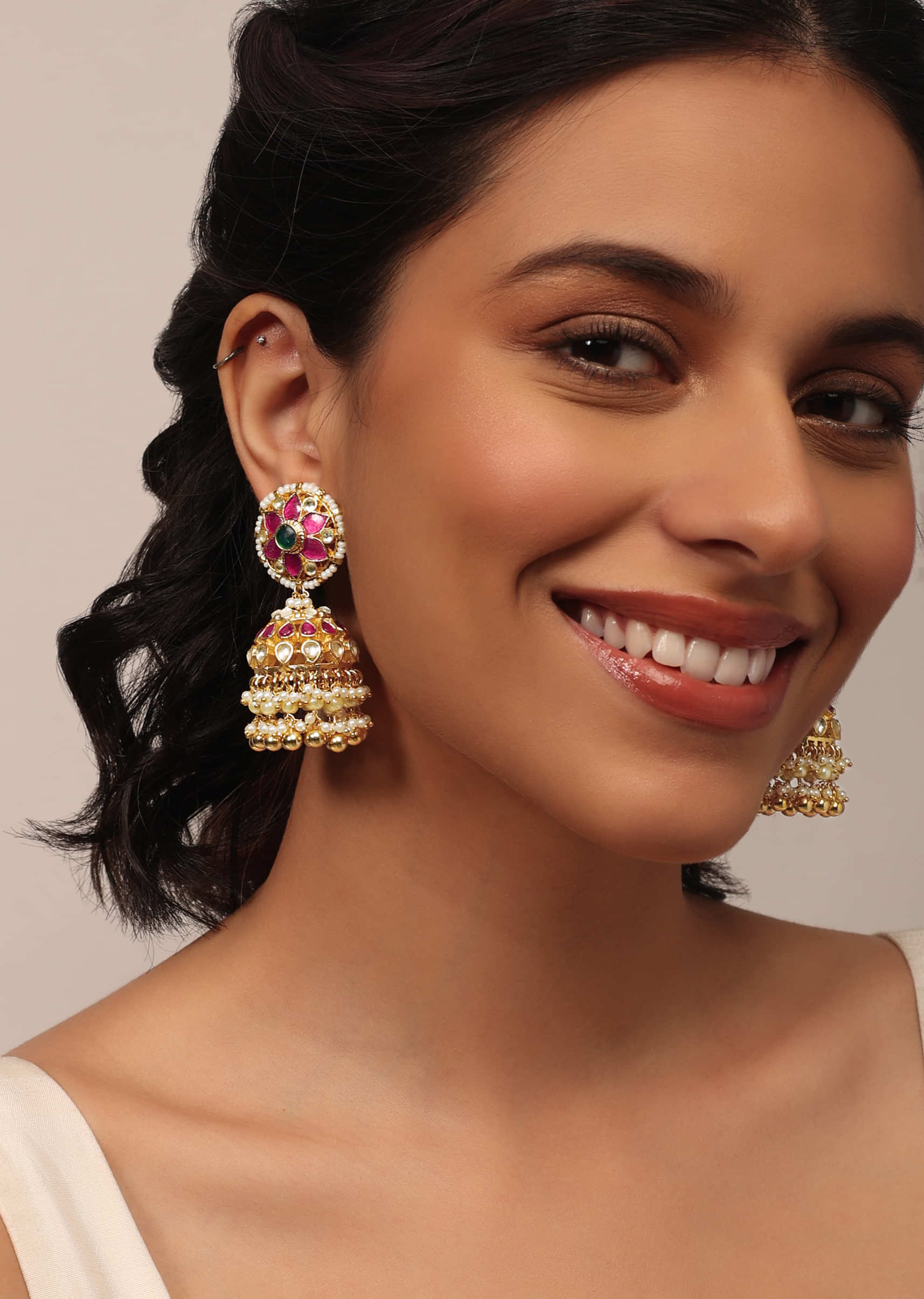 Gold Finish Kundan Earrings With Synthetic Stones And Beads