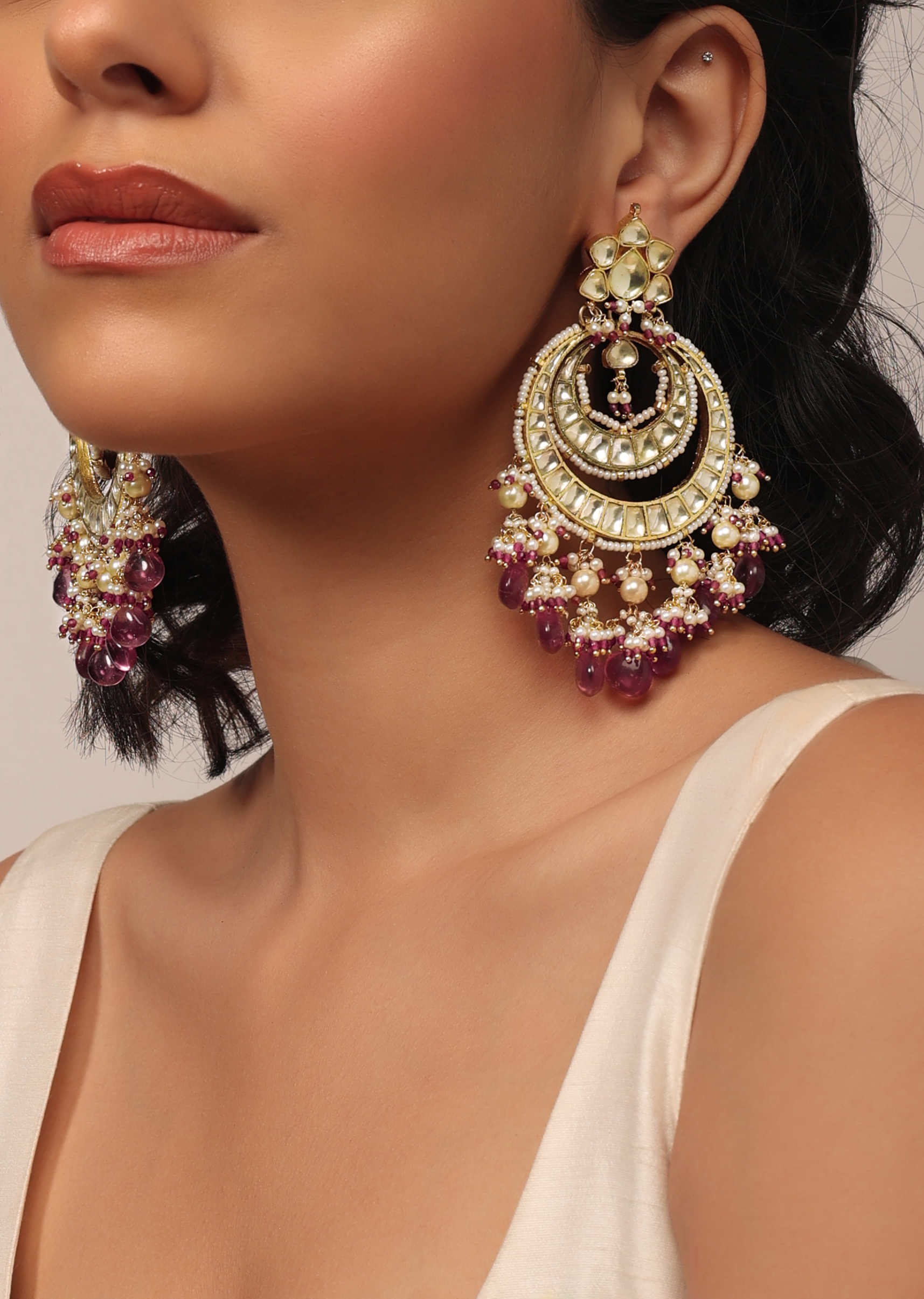 Gold Finish Kundan Earrings With Beads And Ruby Stones
