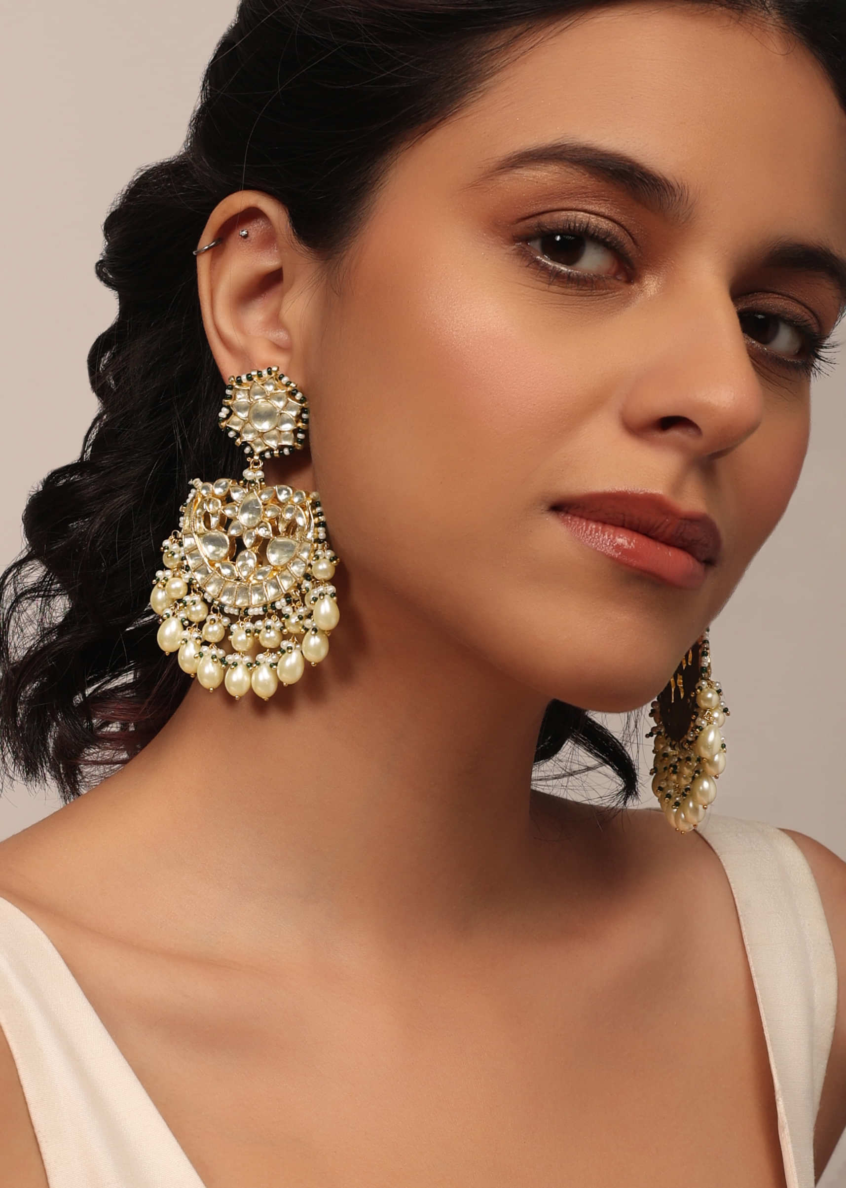 Gold Finish Kundan Chandabali Earrings With Beads And Synthetic Emerald Stones