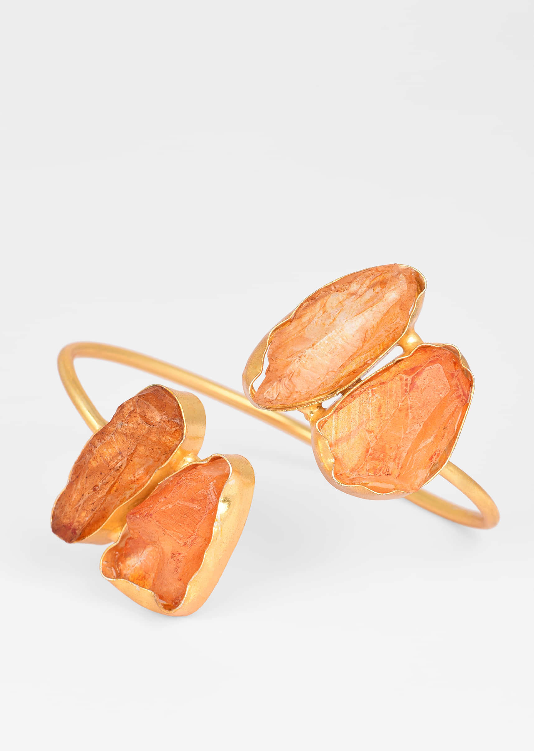 Gold Plated Wrap-Around Bangle With Natural Shaped Rust Colored Semi Precious Stones 