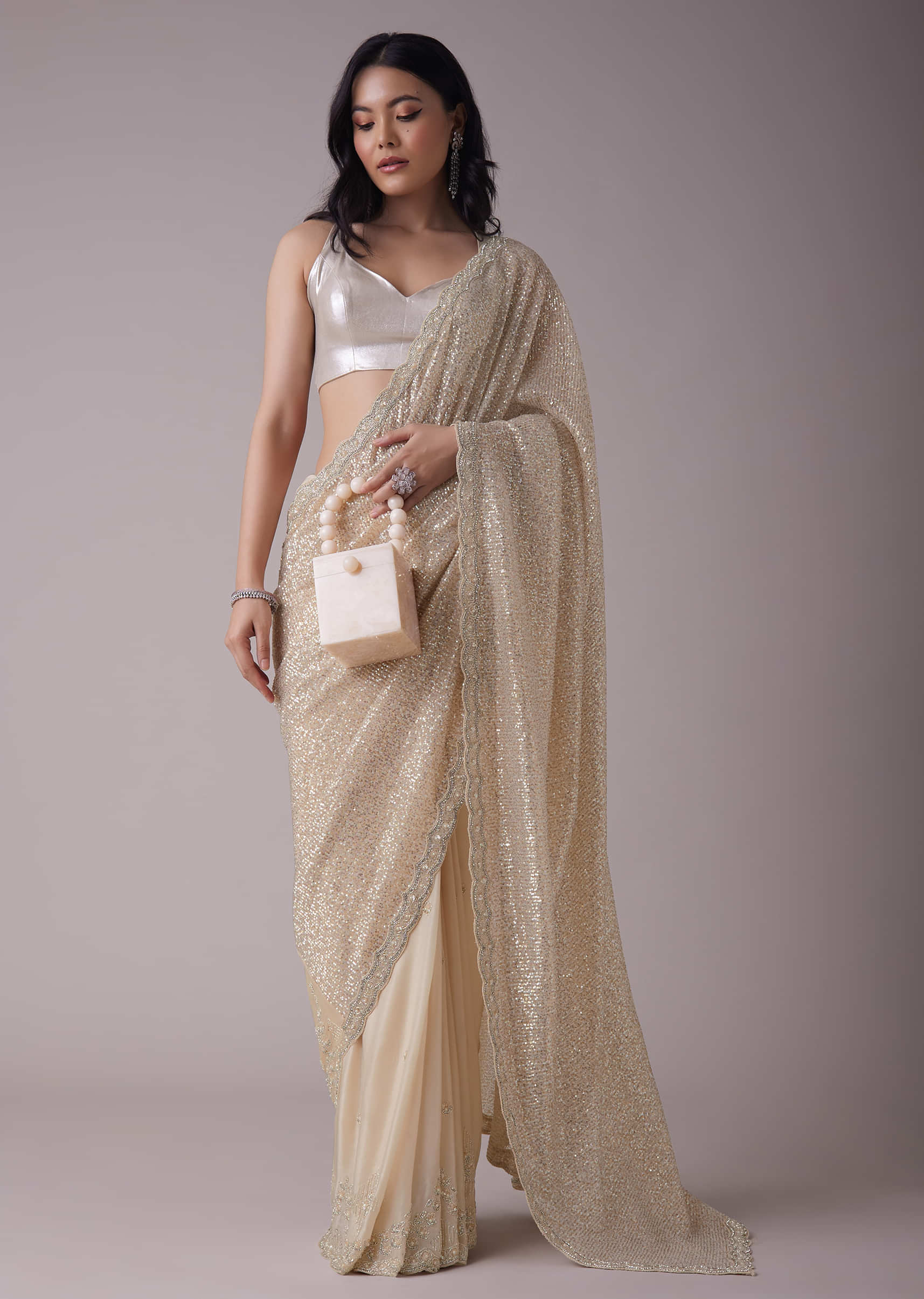 Gold Sequins Saree With An Embellished Border