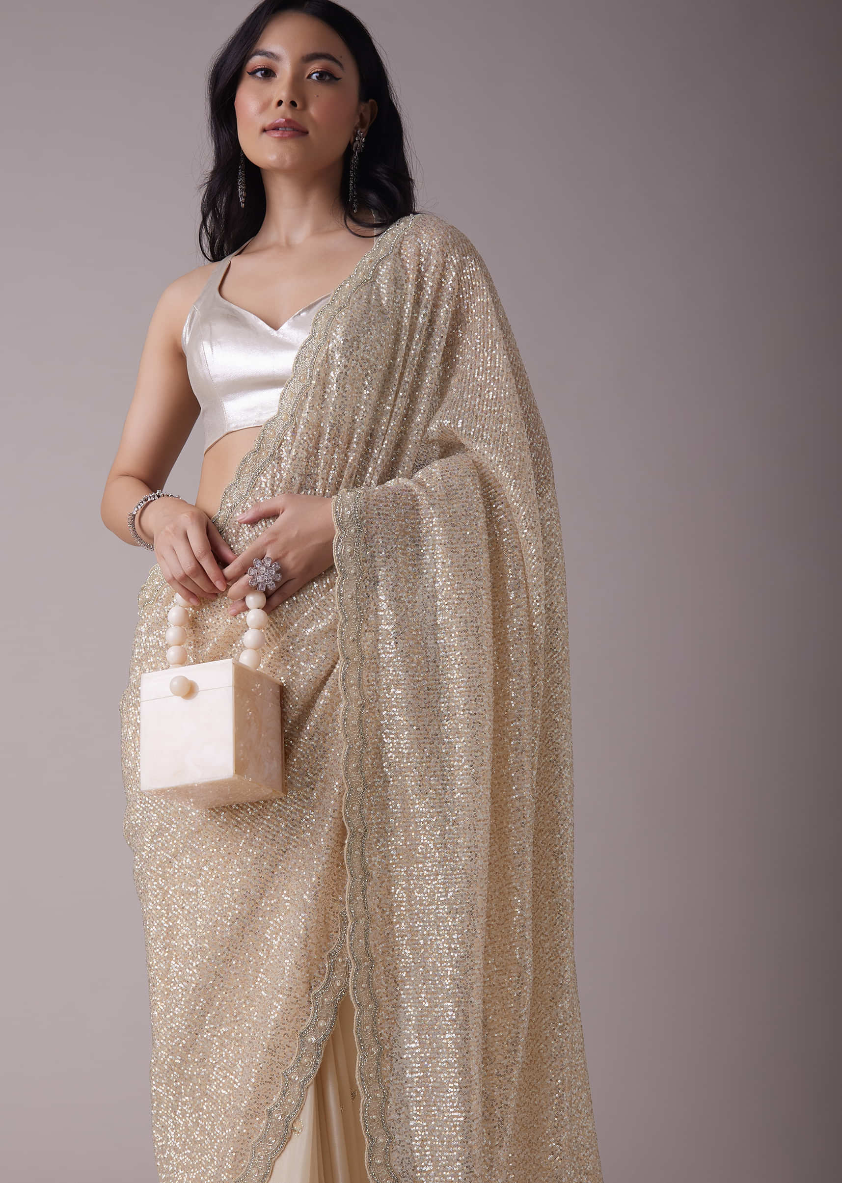 Gold Sequins Saree With An Embellished Border