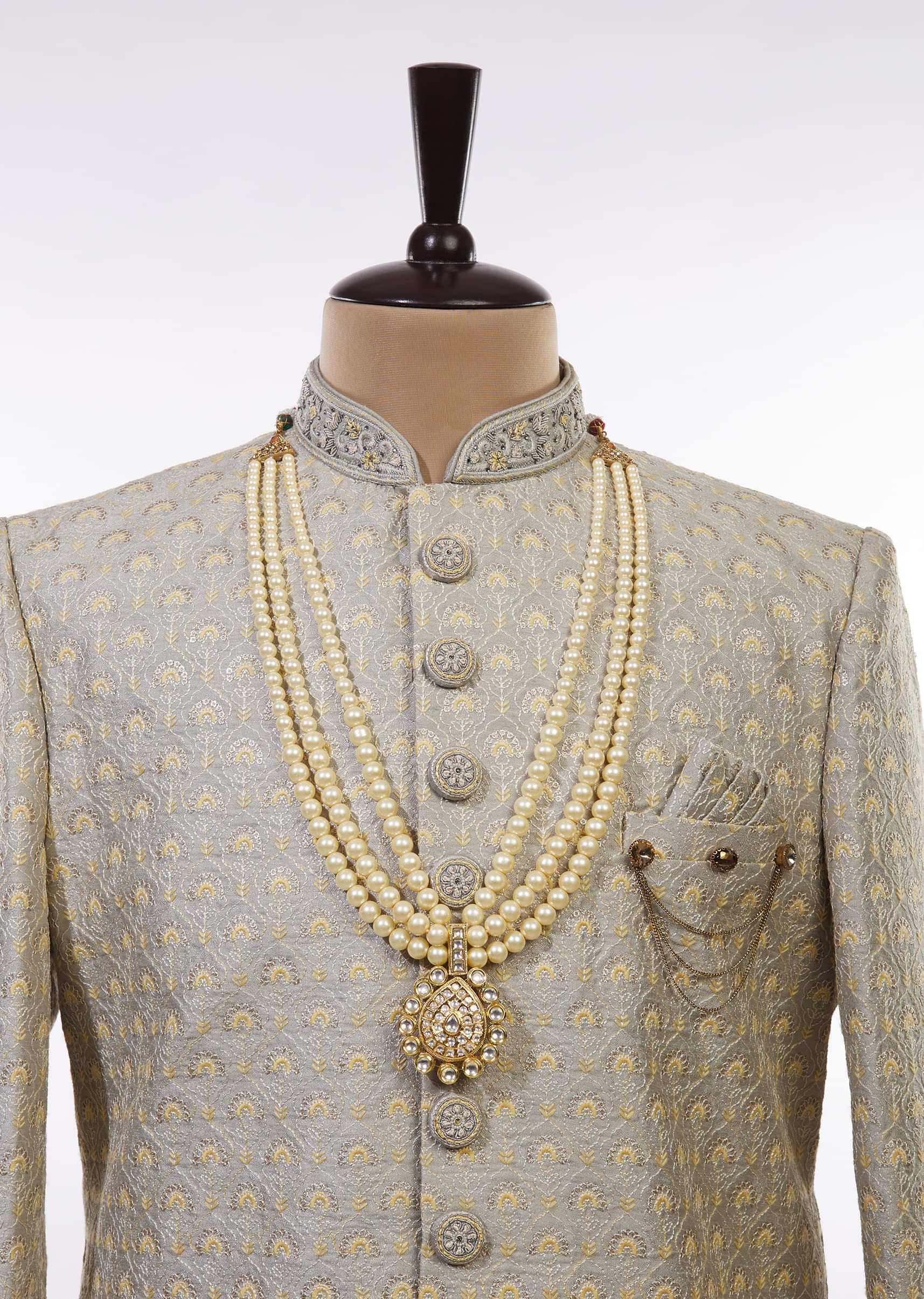 Gold Toned Multi Layered Pearl Mala With Kundan Centre Piece