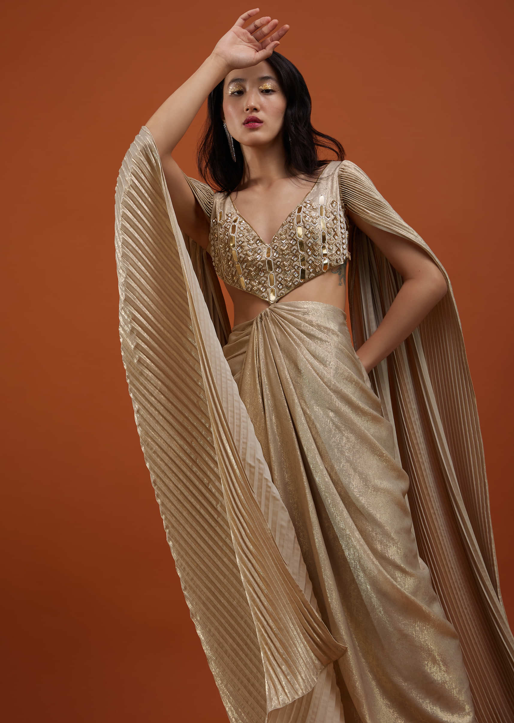 Mocha Brown Gown With A Pre-Pleated Dhoti Skirt Area And Royal Cape Sleeves- NOOR 2022