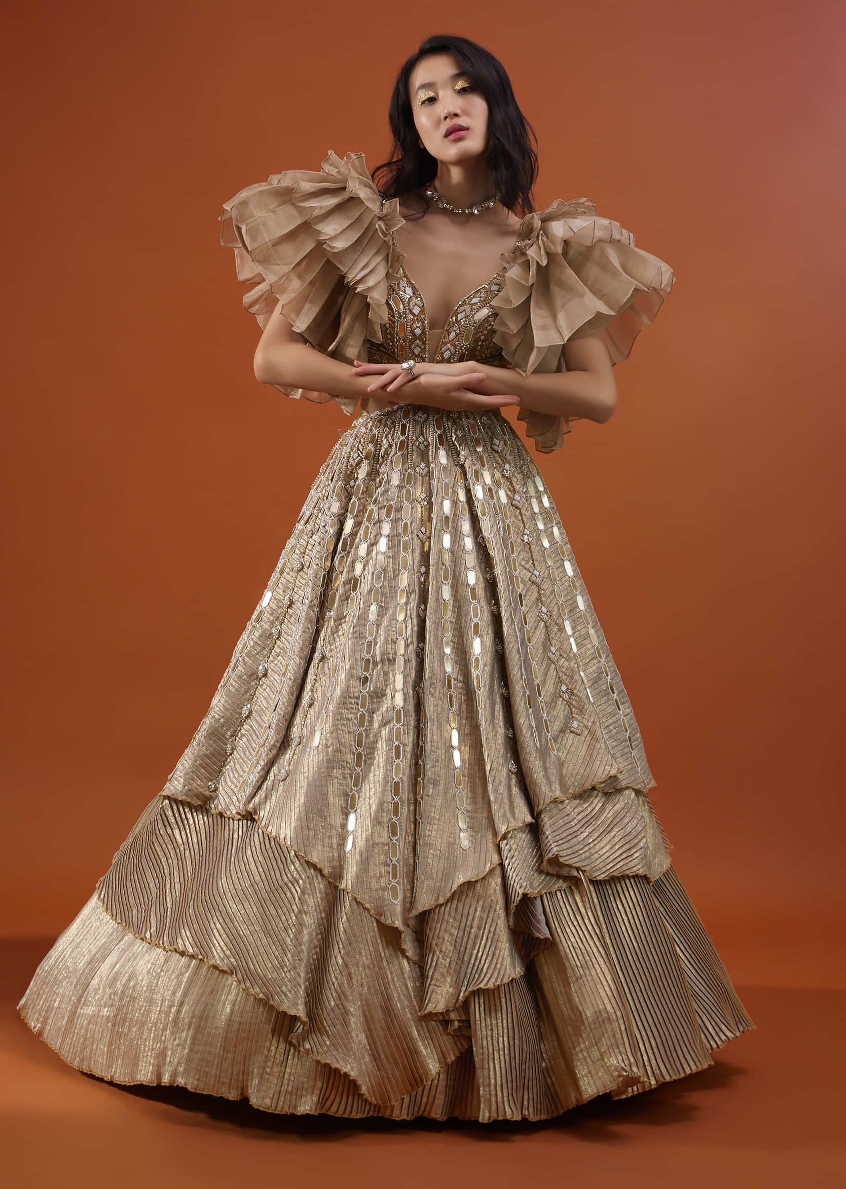 Gold Toned Kalki Gown With Ruffle Sleeves And Embroidery - NOOR 2022