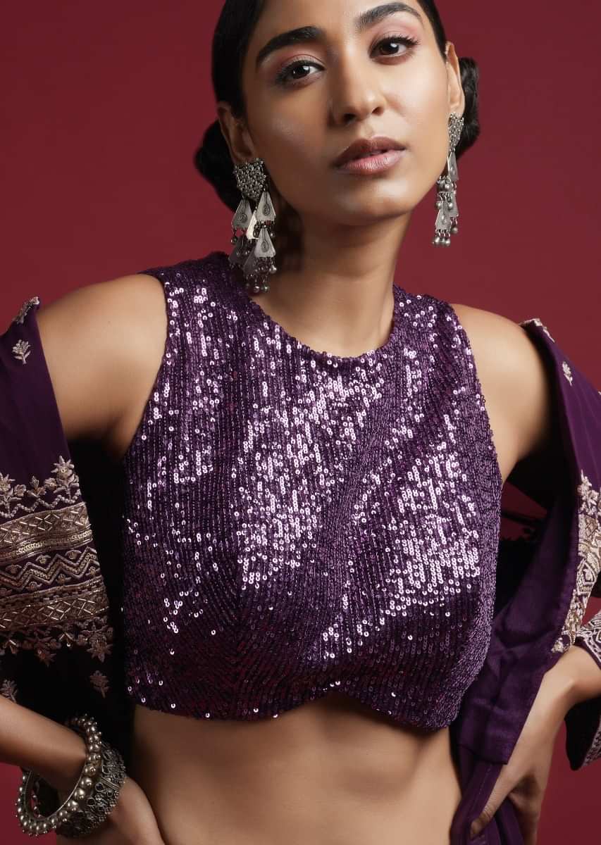 Grape Purple Sleeveless Blouse Embellished In Sequins With Curved Hemline And Back Zip Closure Online - Kalki Fashion