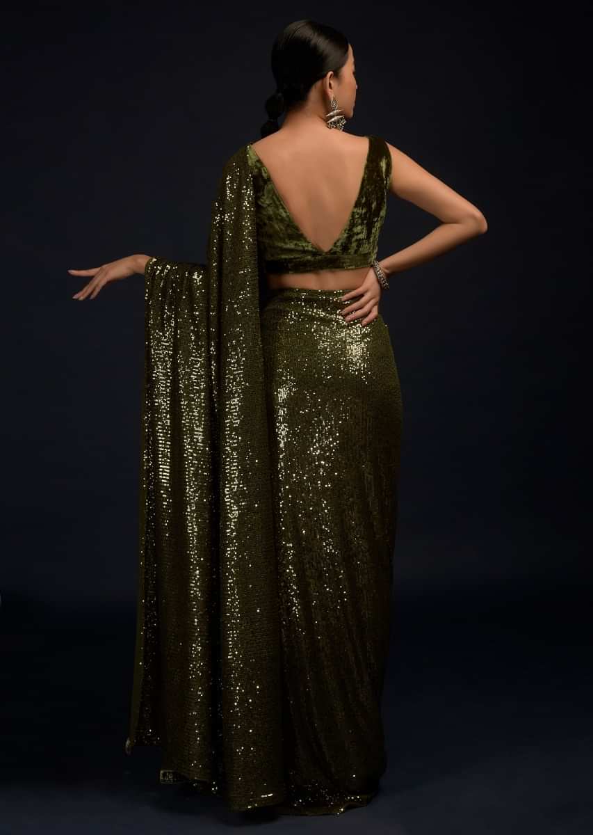 Henna Green Ready Pleated Saree Embellished In Sequins With A Matching Velvet Blouse With Plunging Neckline  