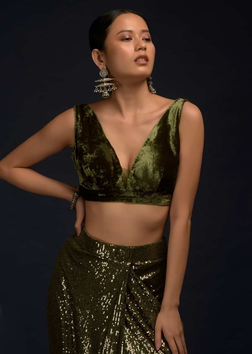 Henna Green Ready Pleated Saree Embellished In Sequins With A Matching Velvet Blouse With Plunging Neckline  