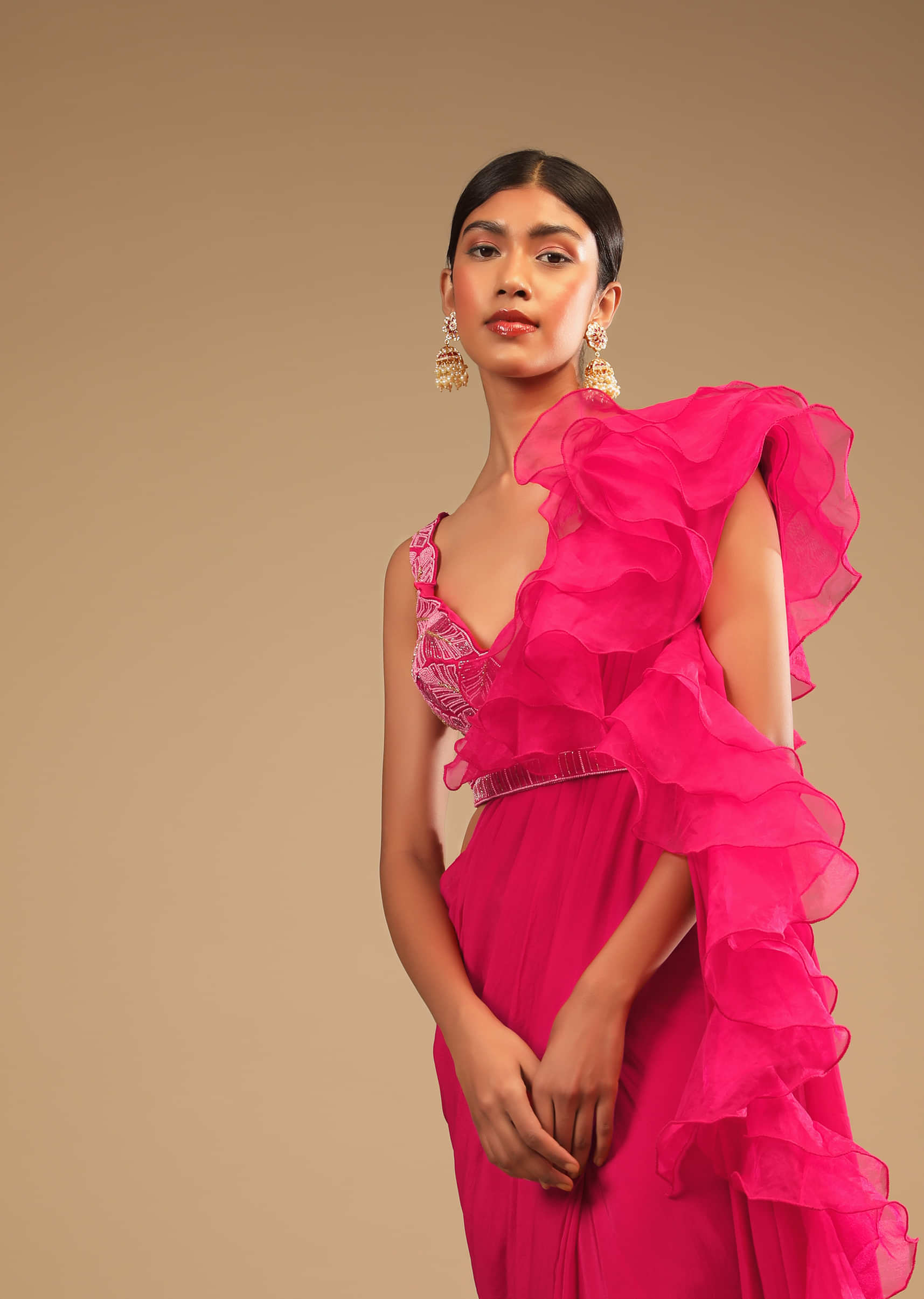 Hot Pink Ready Pleated Saree In Crepe With Ruffle Frill On The Pallu And Beads Embroidered Crop Top And Belt  