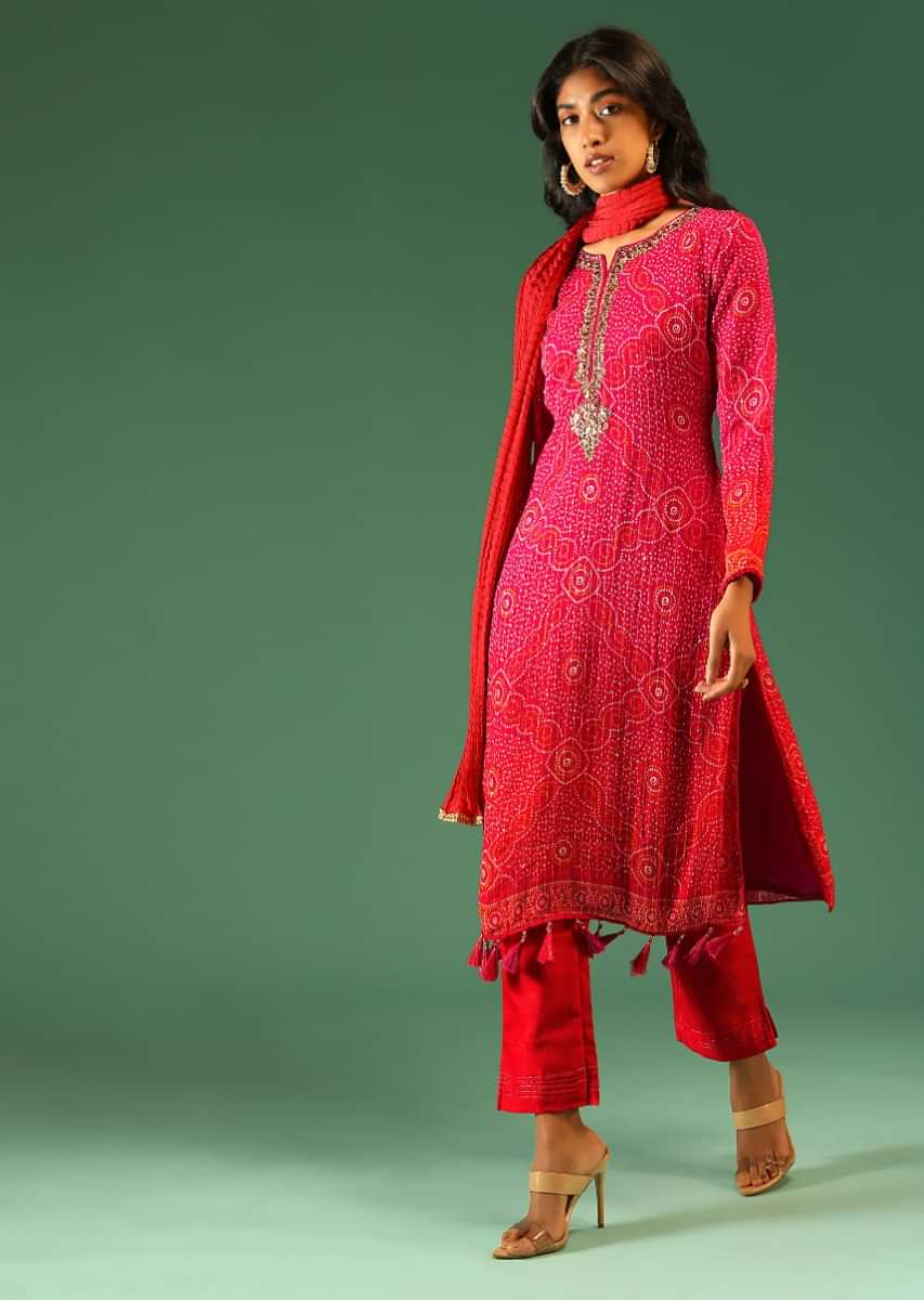 Fire Orange Shaded Straight Cut Chiffon Suit With Tassels On The Hem And Bandhani Pattern Throughout