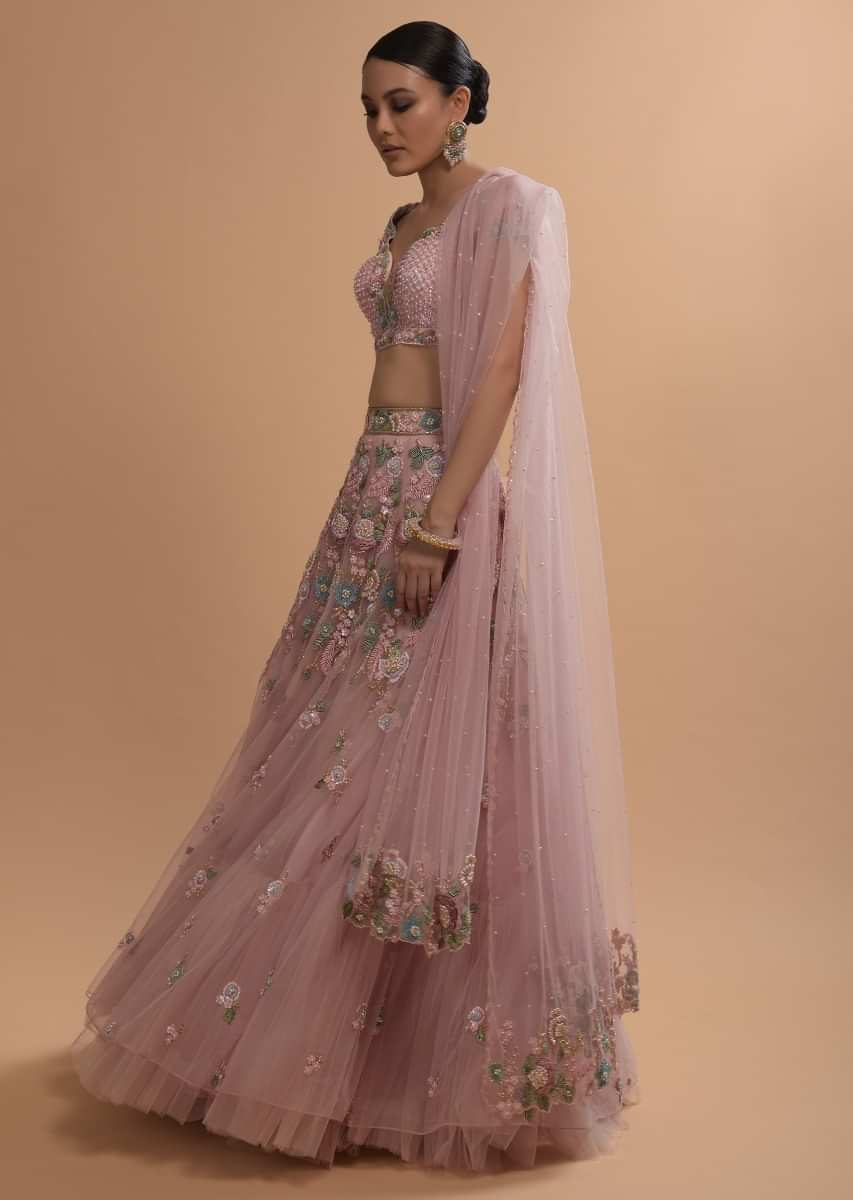 Icy Pink Net Lehenga And Cap Sleeves Crop Top With 3D Flower Cluster And Scattered Buttis 