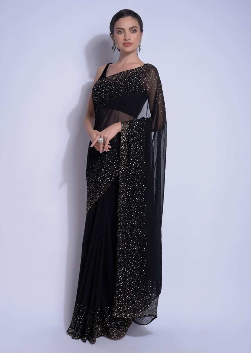 Ink Black Saree In Georgette With Kundan Work On The Border And Pallu