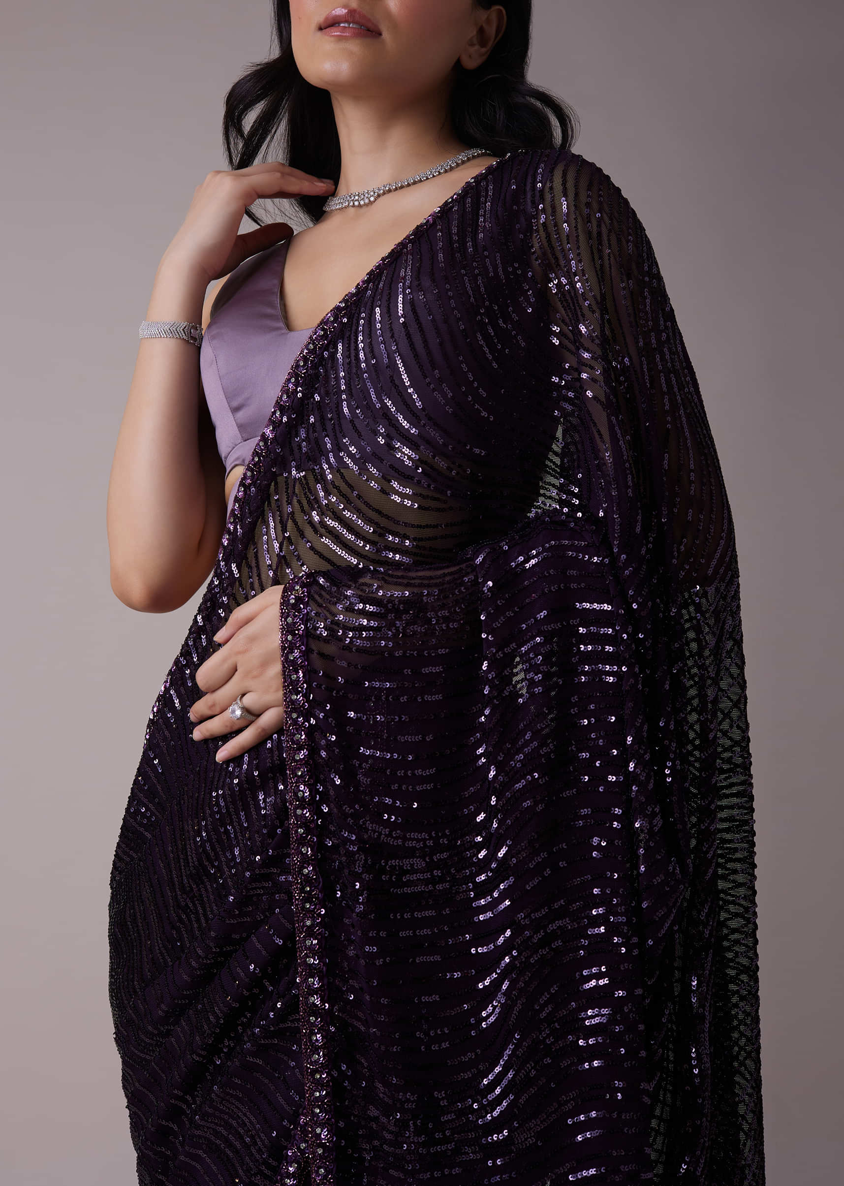 Wine Purple Sequins Saree With An Embellished Border