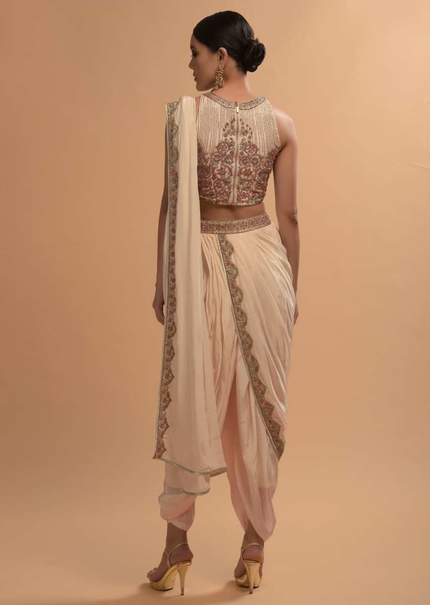 Ivory Dhoti Saree And Crop Top With Embossed Floral Embroidery And High Neckline  