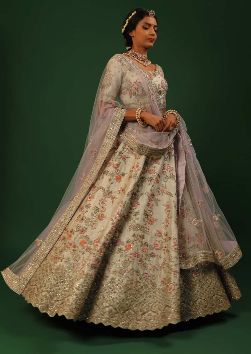 Ivory Lehenga Choli In Raw Silk With Colorful Resham And Golden Zardosi Embroidered Floral Jaal And Cut Work Border 